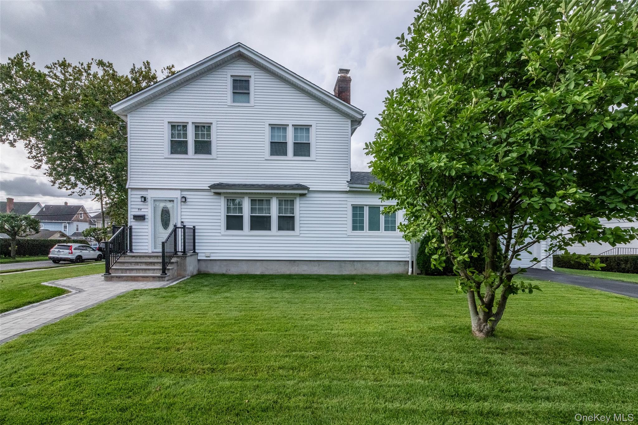 Move right in to an immaculate and fully renovated home.    The comple...
