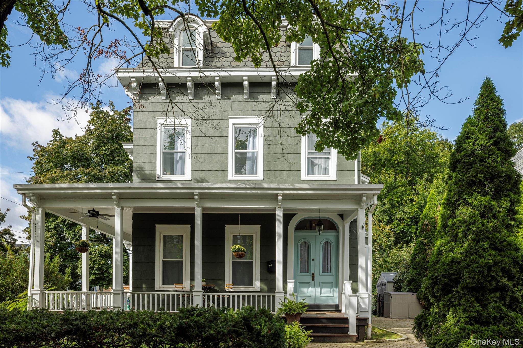 Approaching 200 Nelson, a charming 1880 Second Empire Victorian in the...