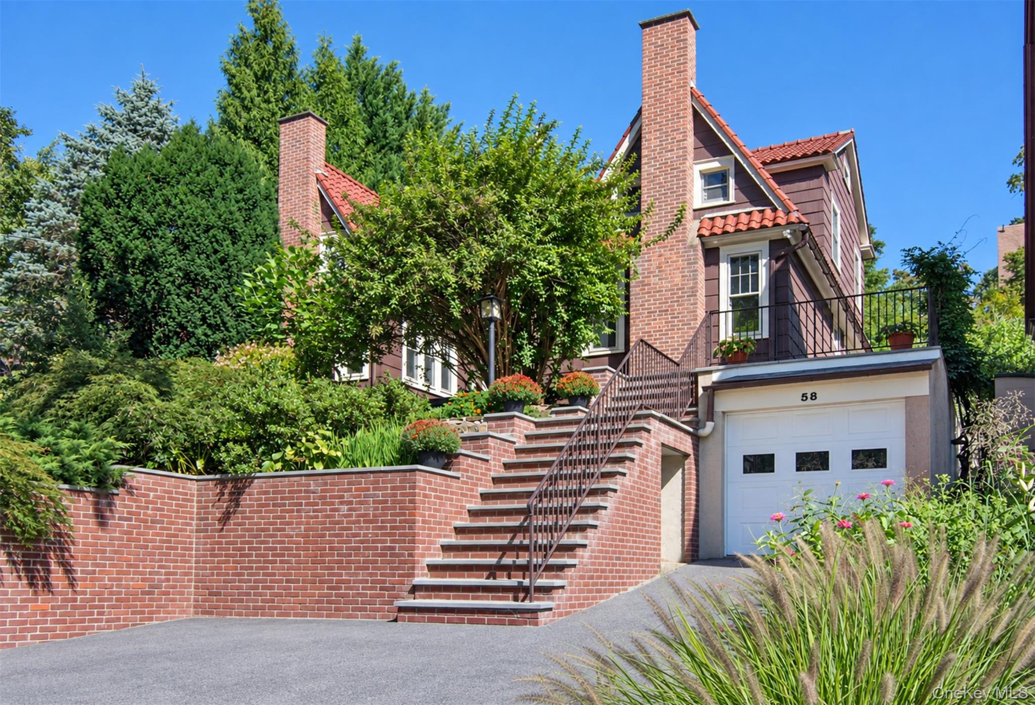 Welcome to 58 Young Avenue, a rare and exceptionally versatile two-fam...
