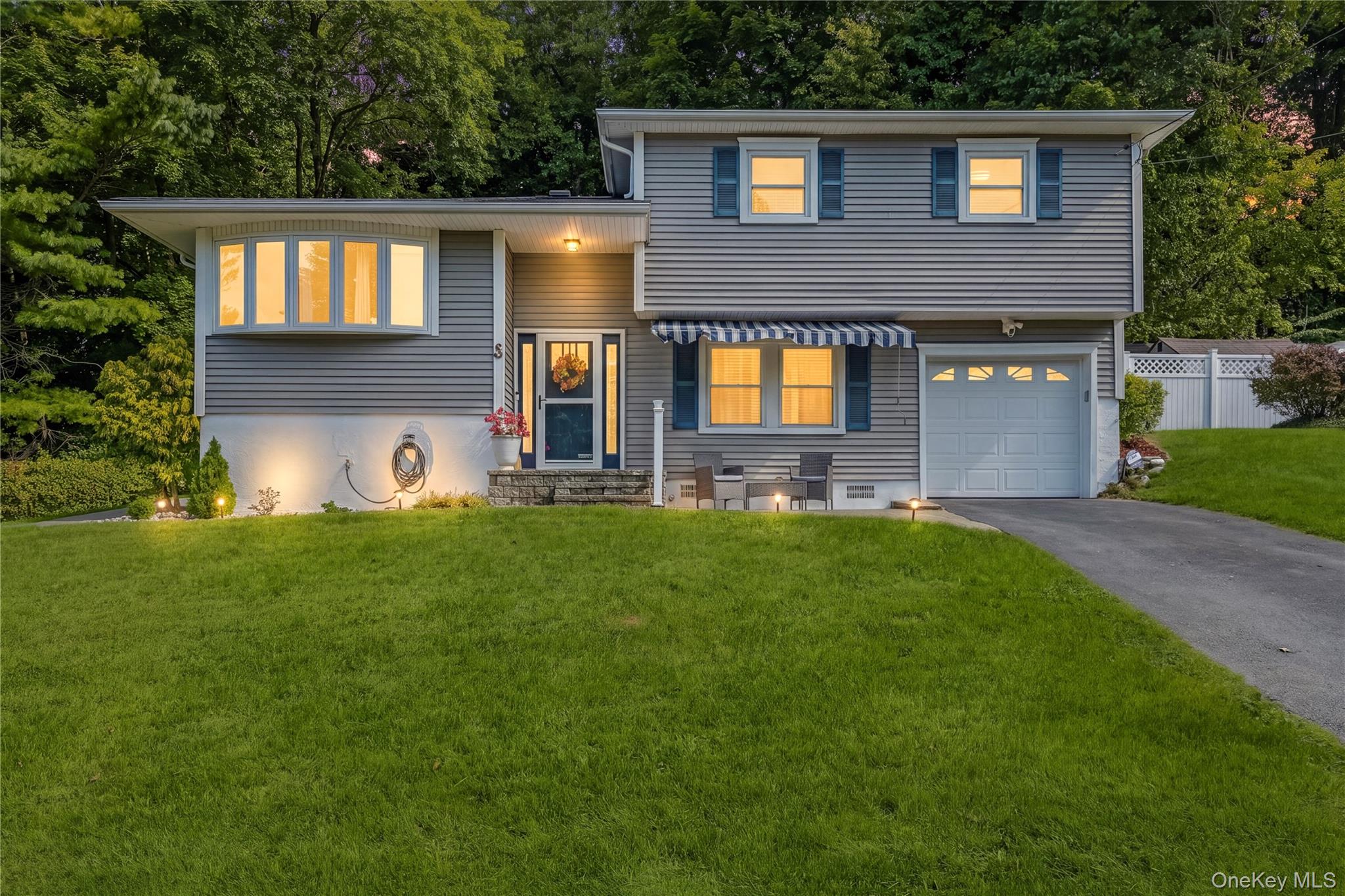 Welcome to this inviting 3 bedroom, one and a half bath split-level ho...