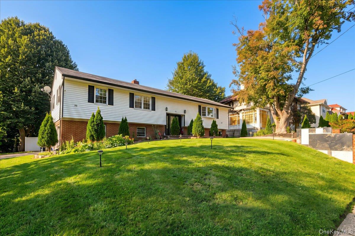 Welcome home to this stunning split-level retreat in Mount Vernon, NY!...