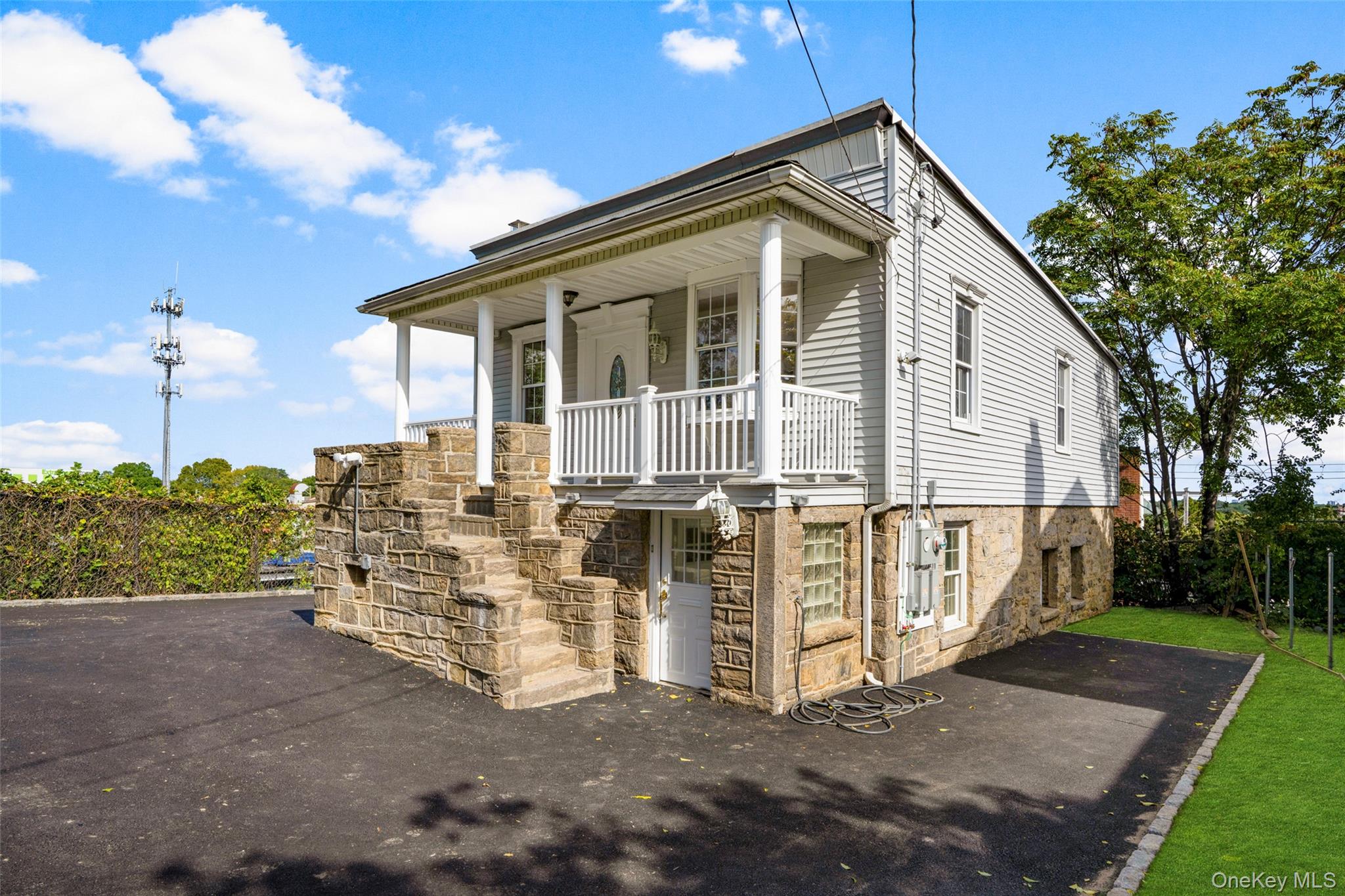 Completely renovated 2 family home offering modern updates, flexible l...