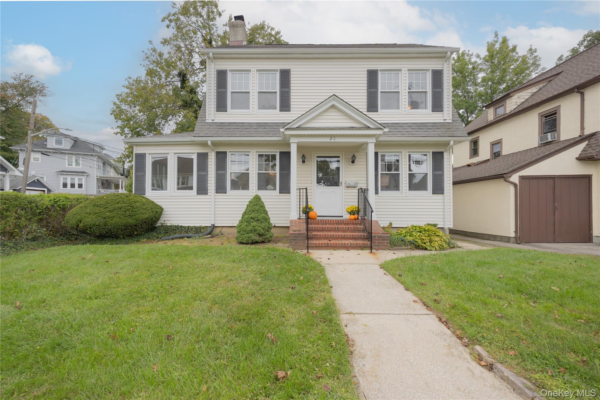 Welcome home to 20 Byron Avenue, a charming Dutch Colonial nestled on...
