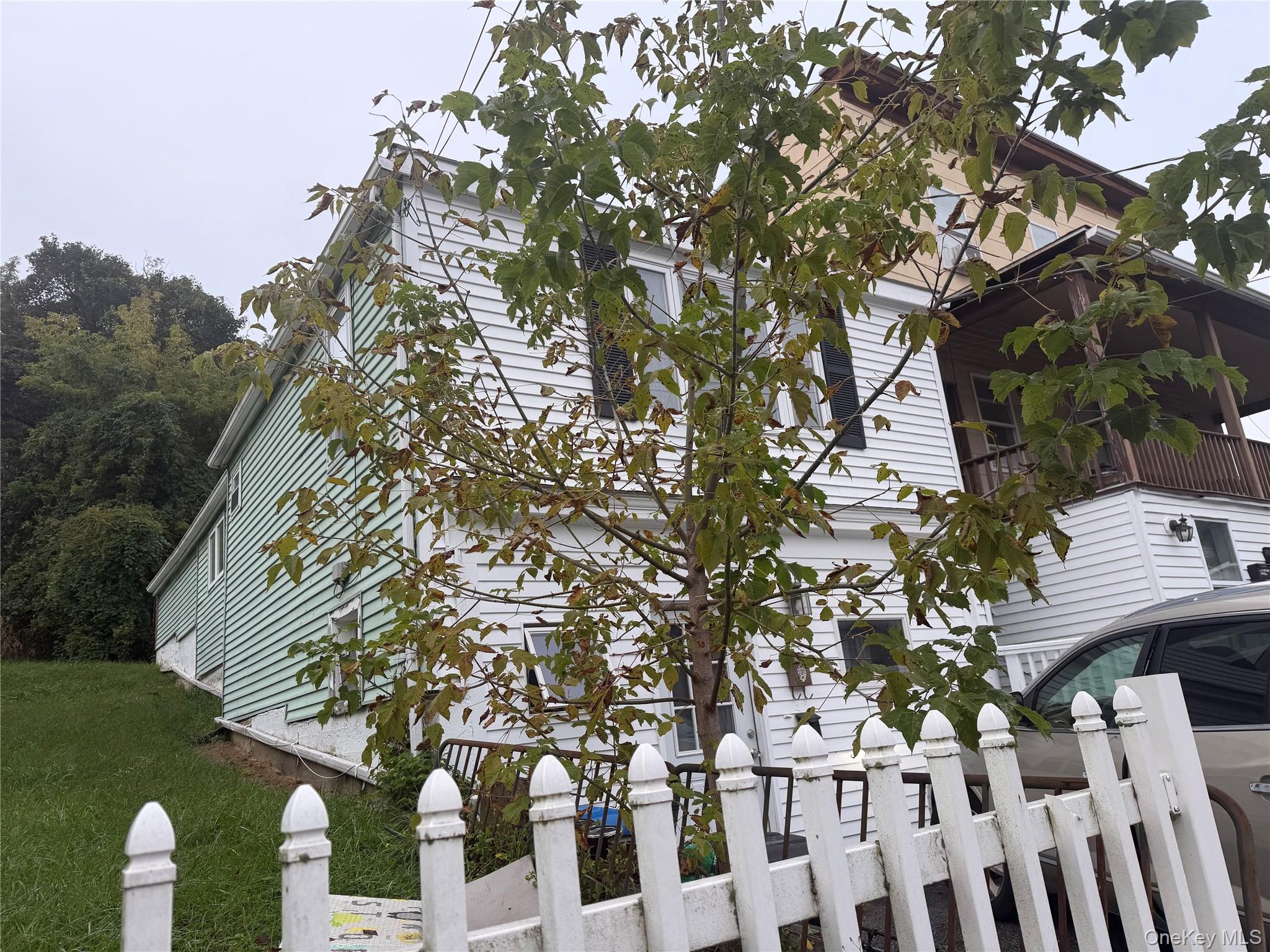 Exceptional Investment Opportunity – Legal 4-Family Property with Two...