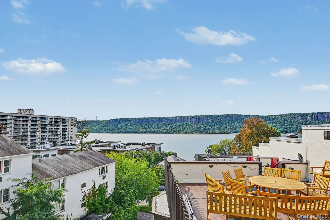 Beautifully updated tri-level condo featuring stunning river views and...