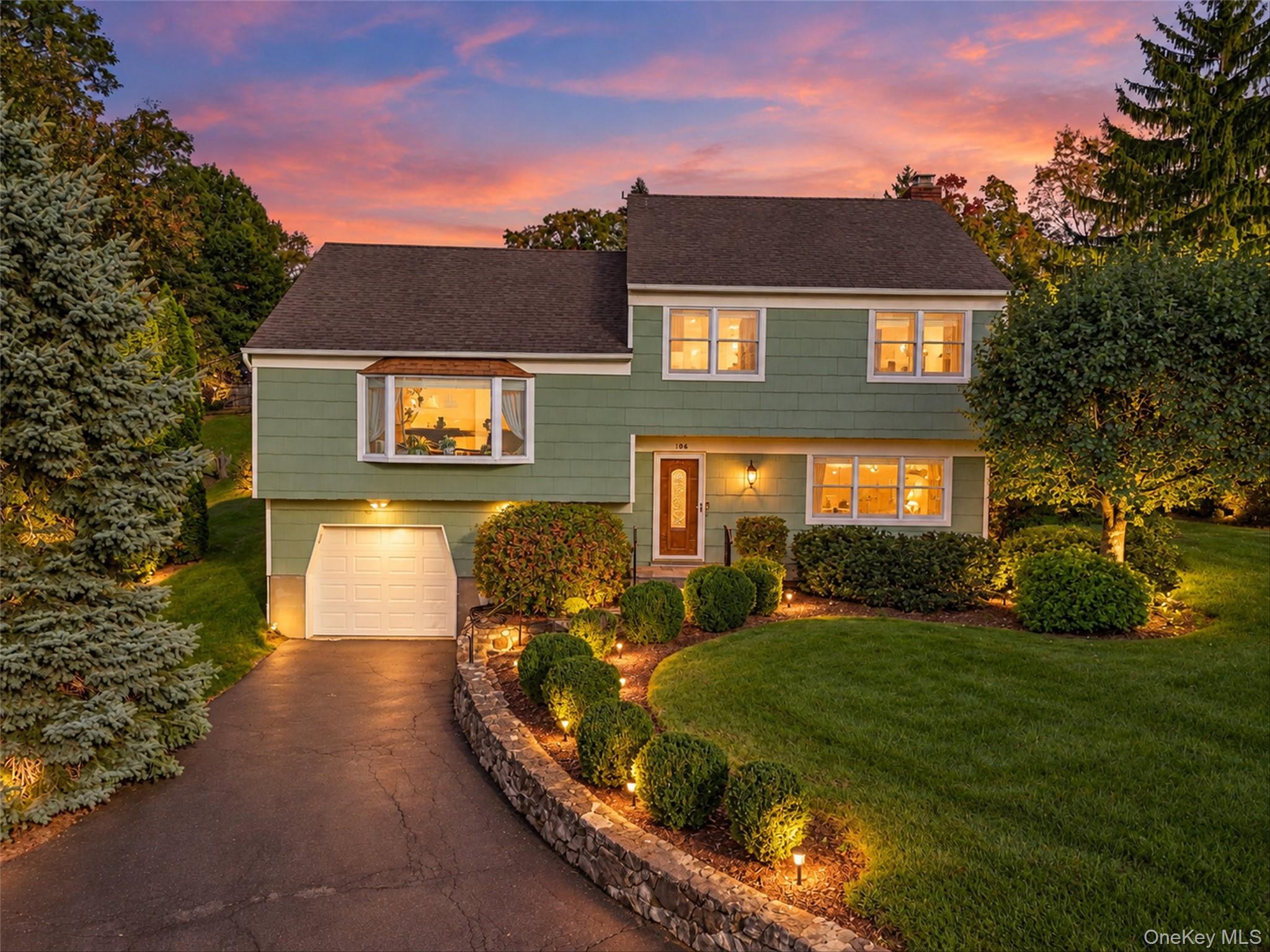 Welcome to this charming split-level home nestled on a spacious, priva...