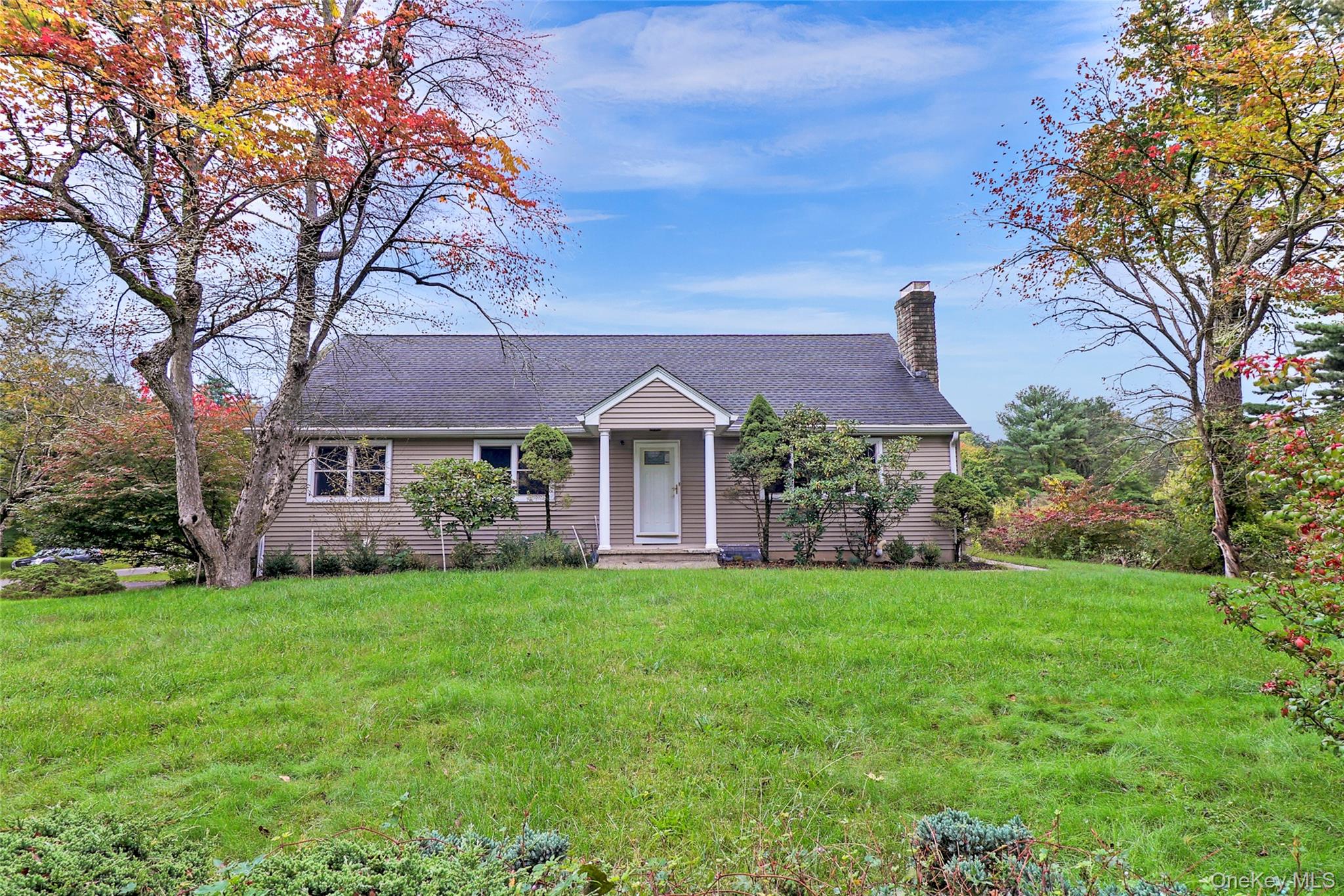 A private acre, a sought-after Chappaqua location, and the convenience...