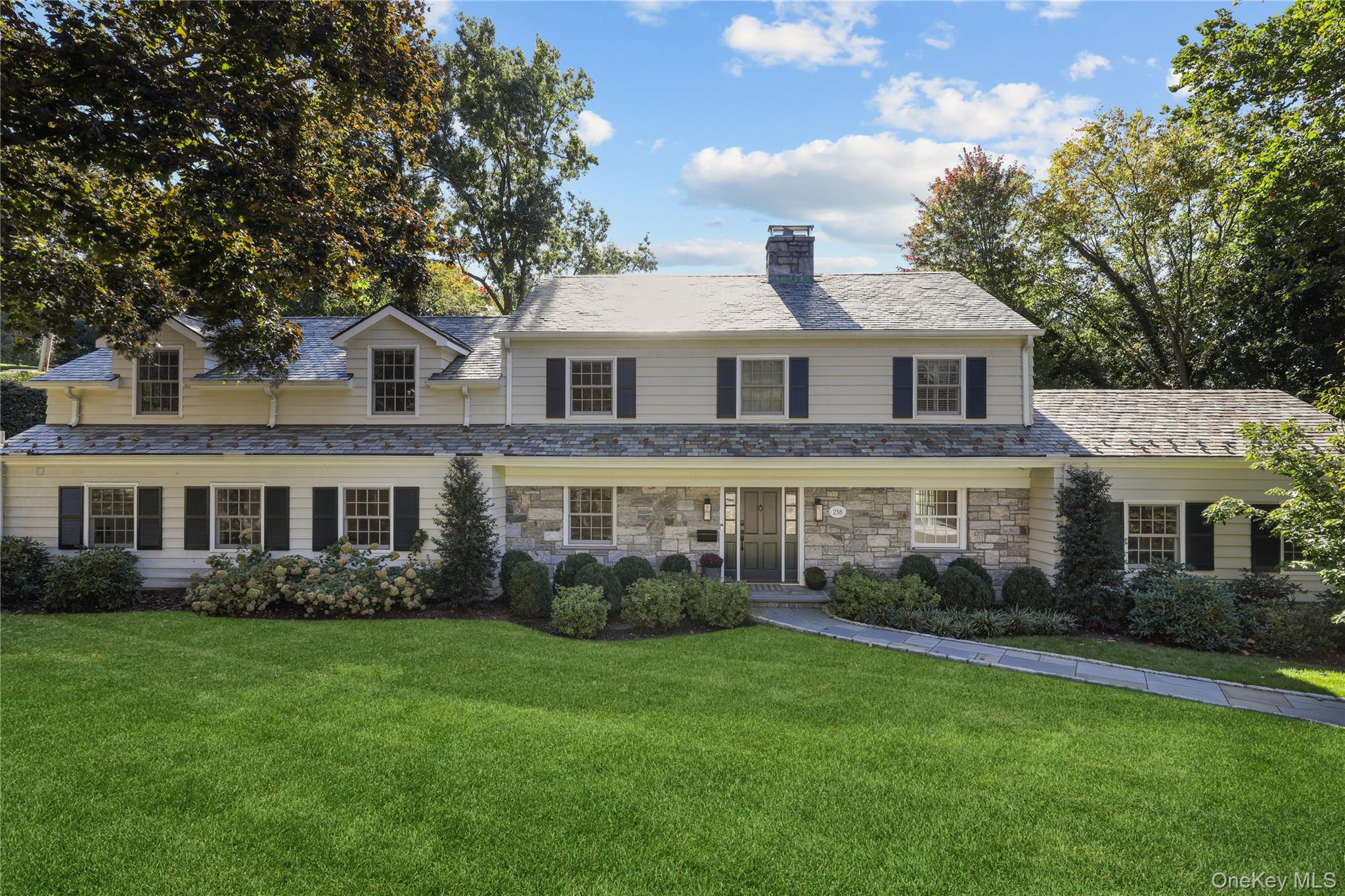 Meticulously updated and generously proportioned, 238 Pondfield Road o...