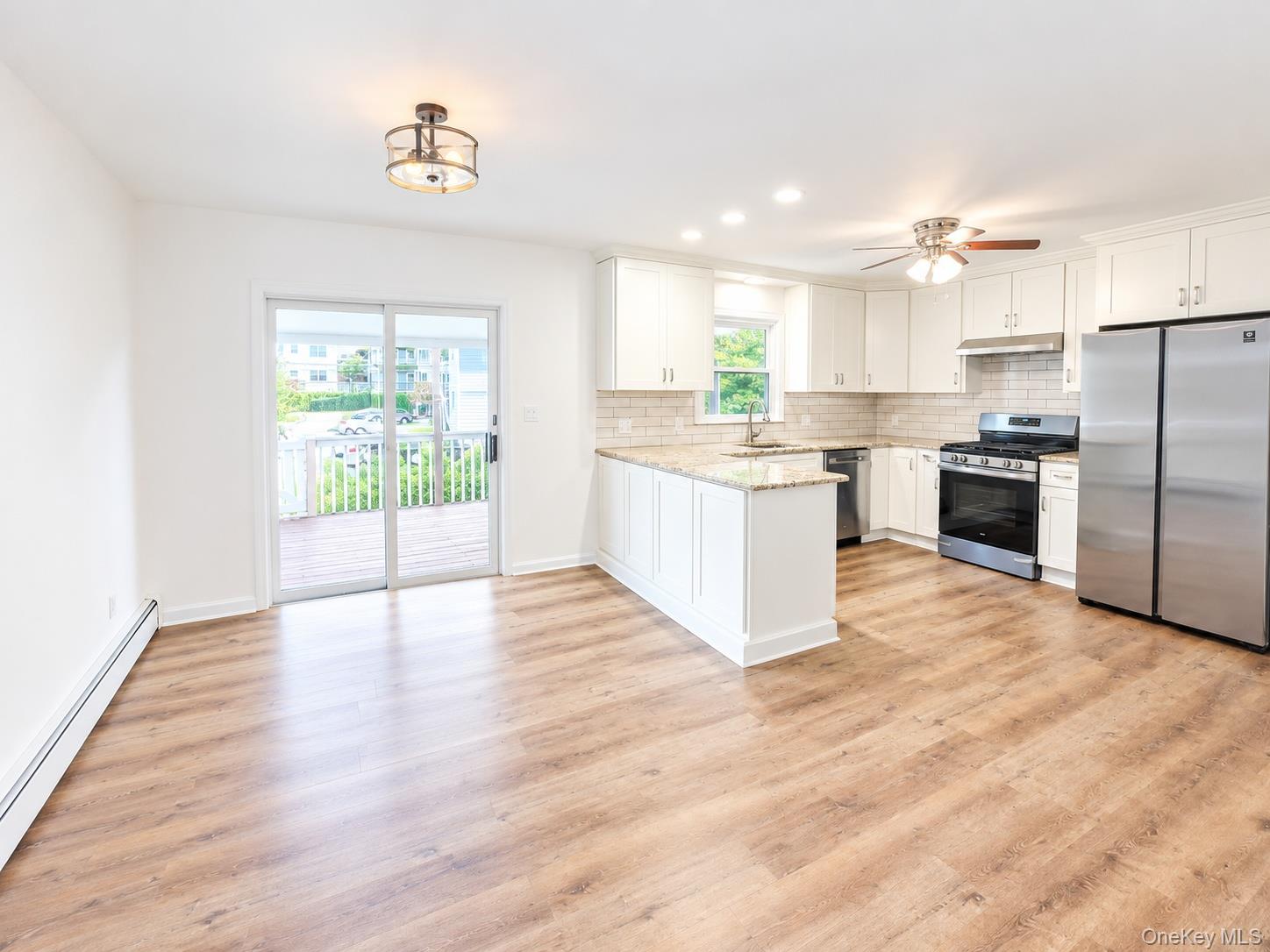 come see this amazing and completely renovated 3- bedroom second floor...