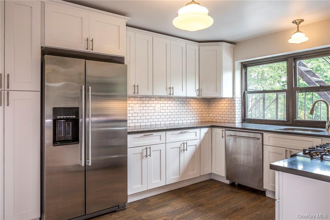 Located at the Bronxvillle Train Station, this three bedroom, two bath...