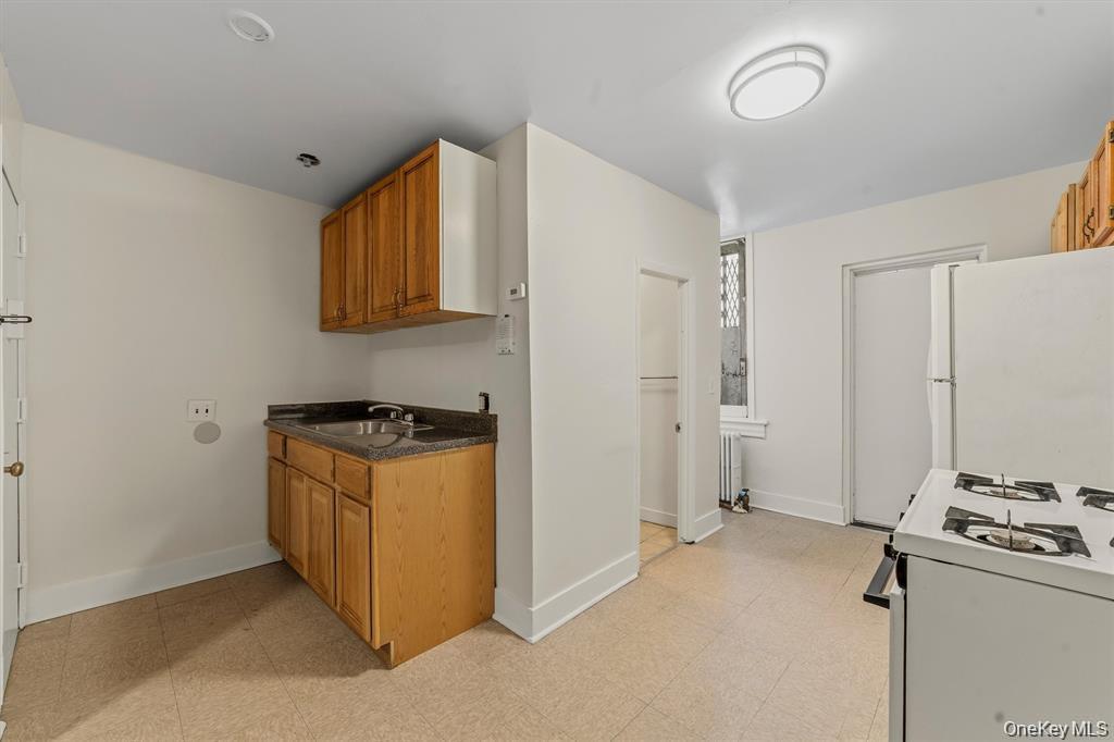 Nobody is above you in this large 2 Bedroom Rail-Road style apartment...