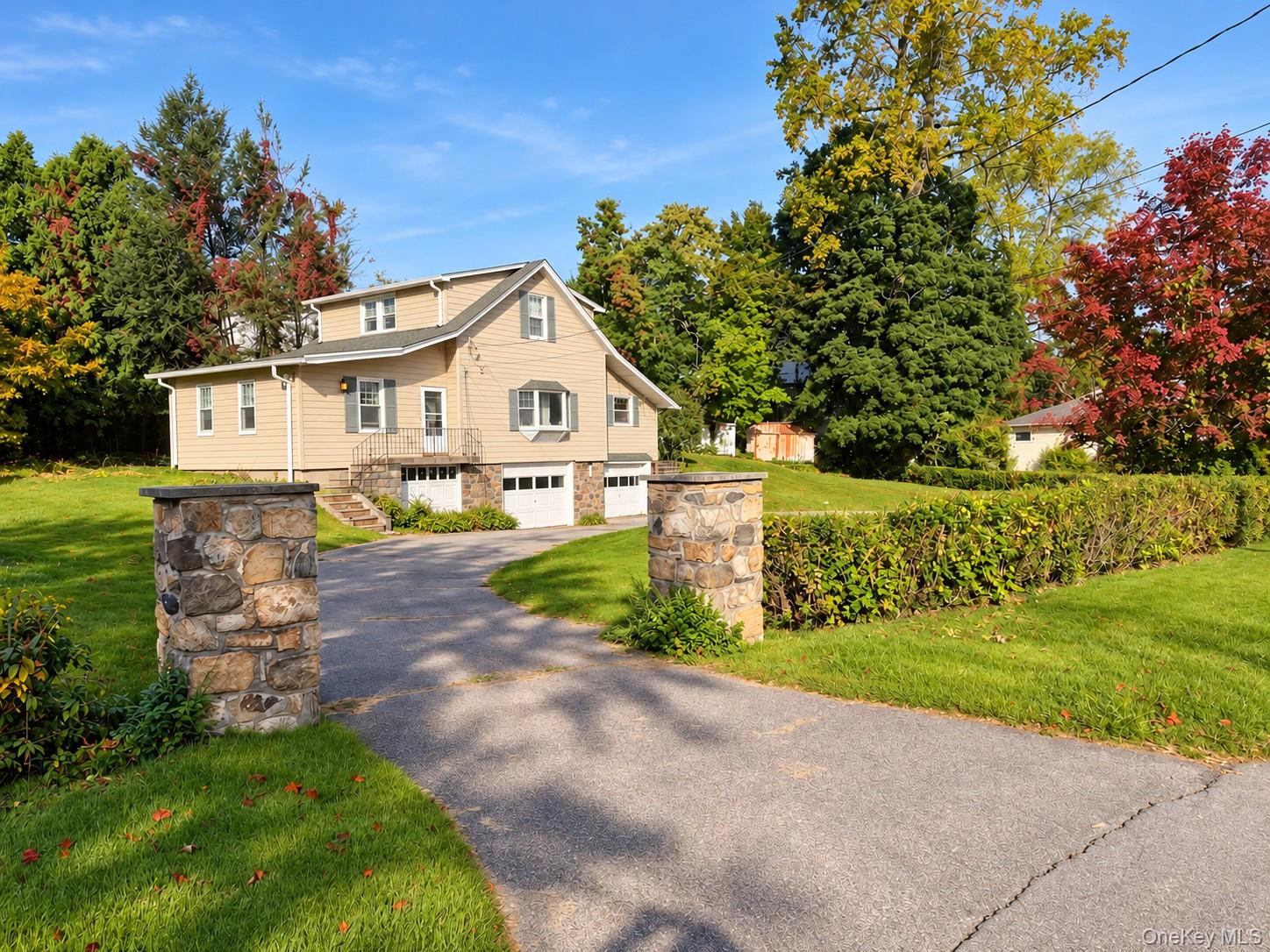Beautifully landscaped .36-acre Cape Cod offering a flexible and invit...