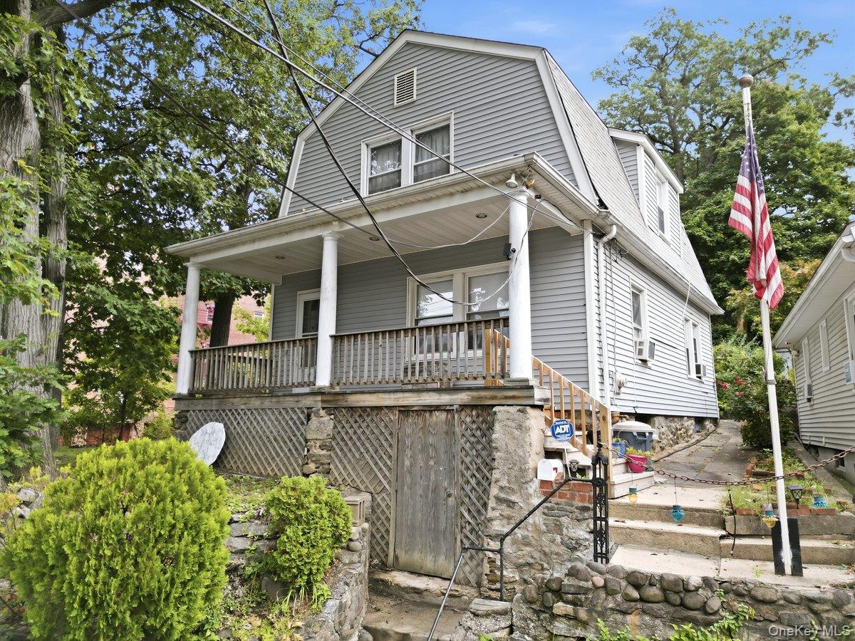 Nestled on an expansive property spanning two lots, this charming and...
