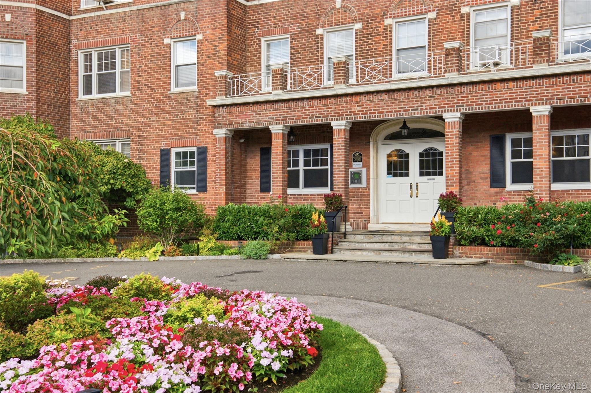 Welcome to 50 North Broadway, a charming and well-maintained cooperati...