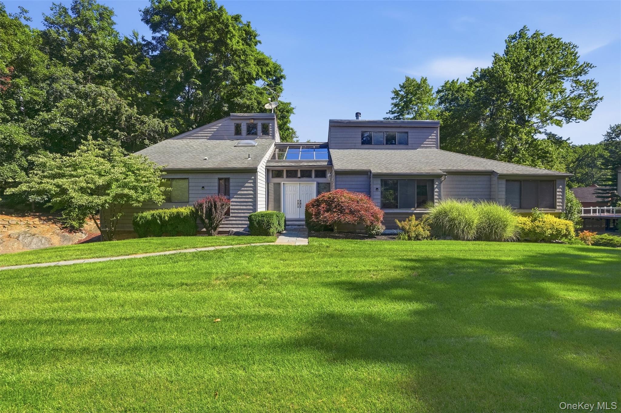 Tucked beside the trails and woodlands of Rockefeller State Park Prese...