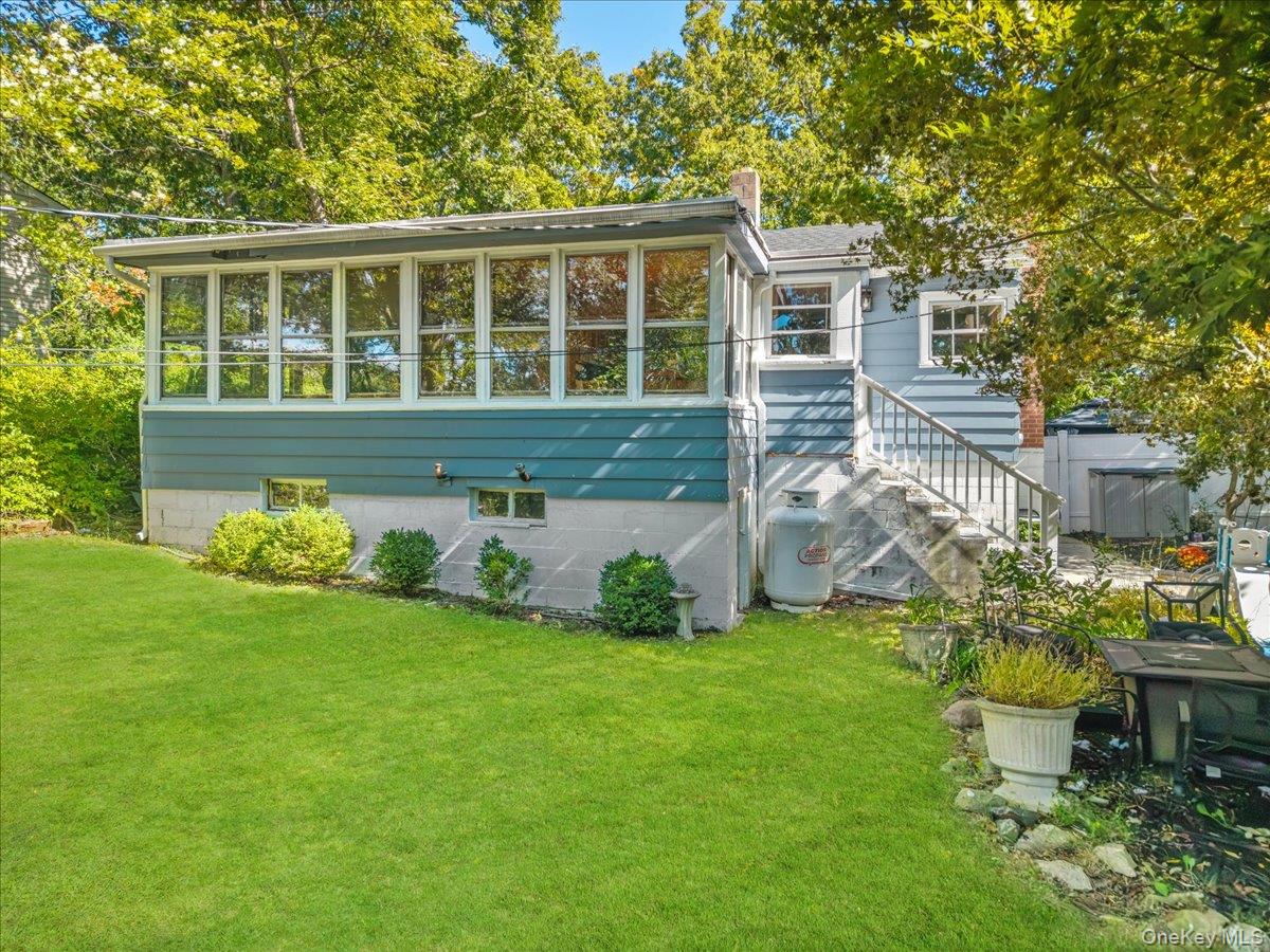 Welcome to this charming Lake Peekskill cottage, where peaceful surrou...