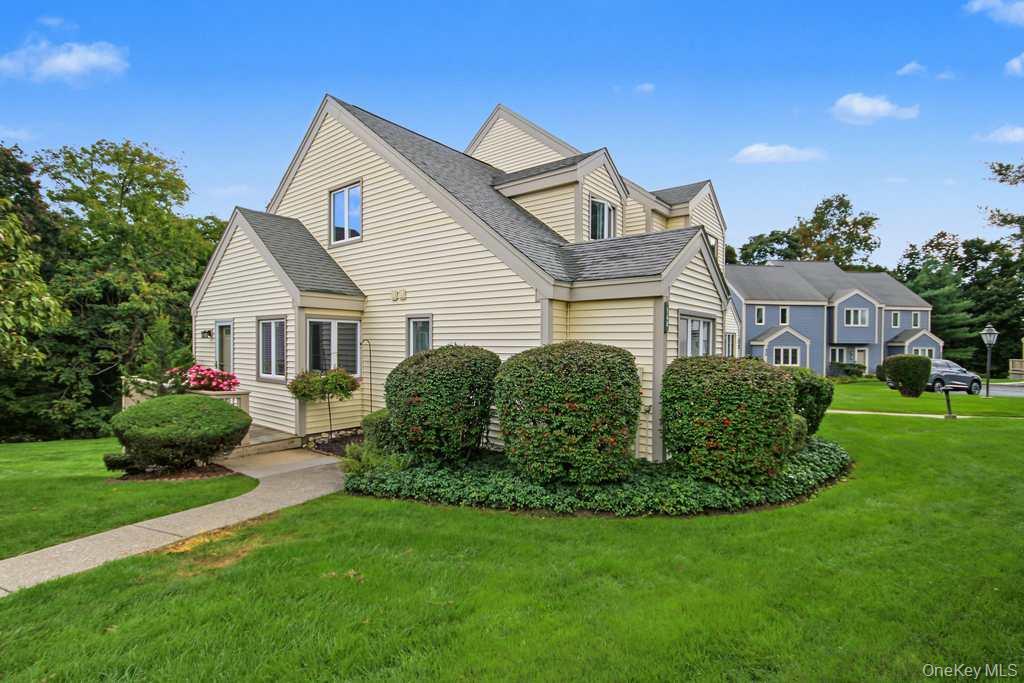 Welcome to this beautifully updated end-unit townhouse at The Fields a...