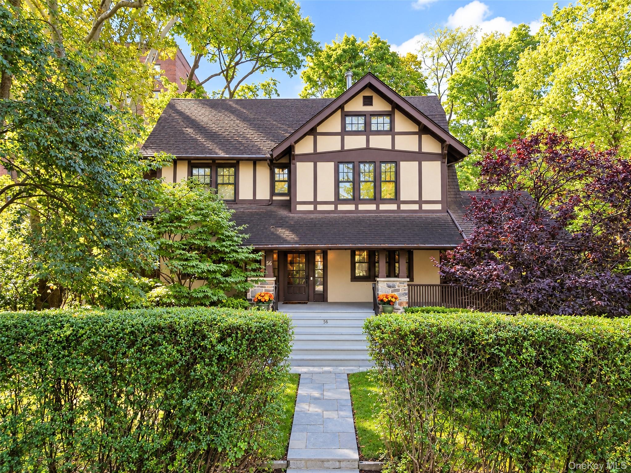 Classic Tudor Charm Meets Colonial Center Hall Elegance. Rich in Chara...