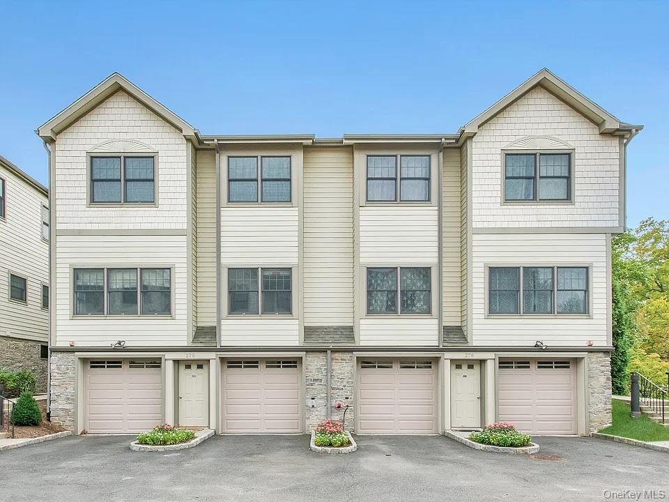 Luxury Townhome Living in the Heart of White Plains! Freshly painted a...