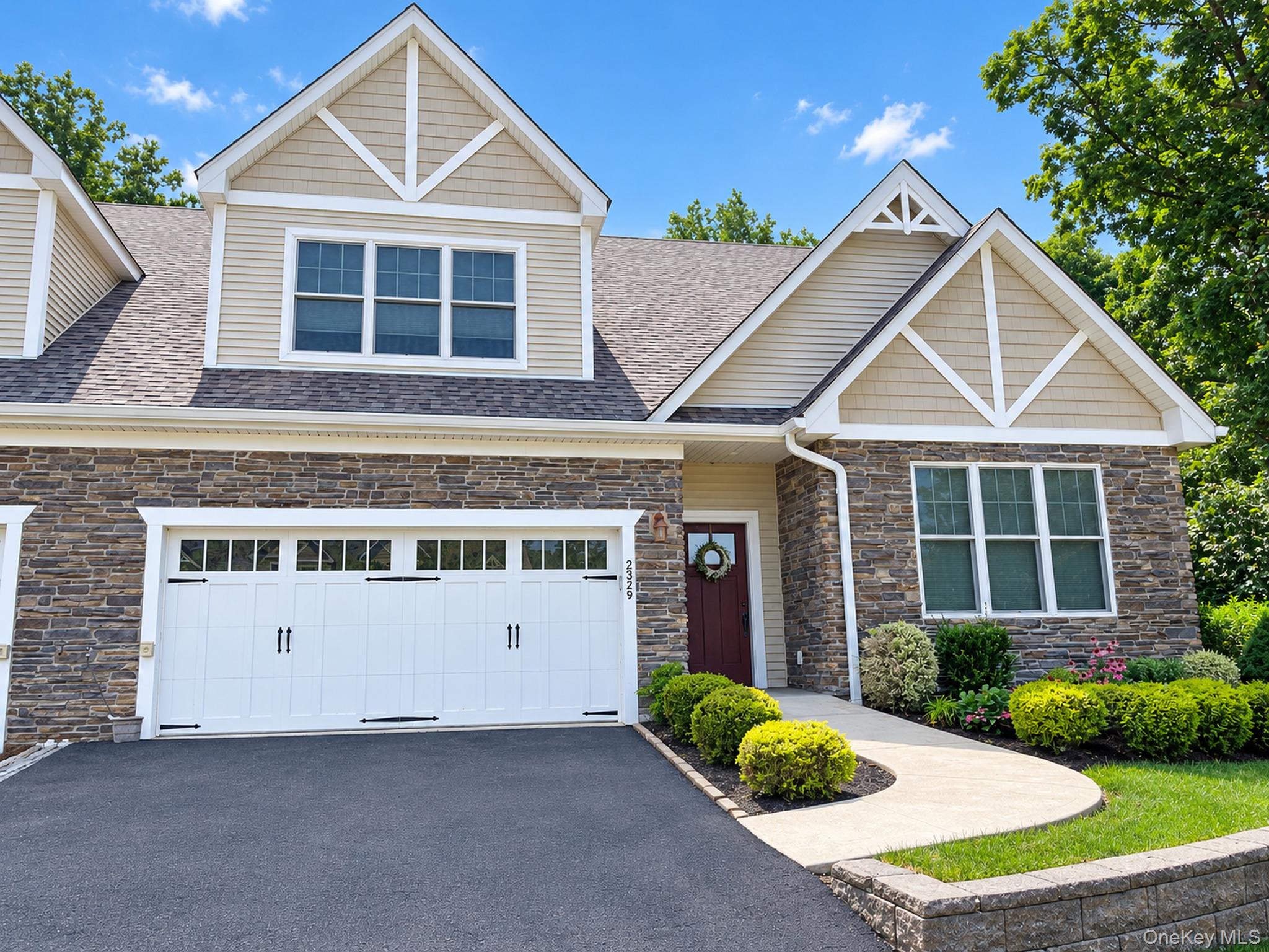 Exceptional End Unit | First-Floor Primary Suite | Two-Car Garage Plus...