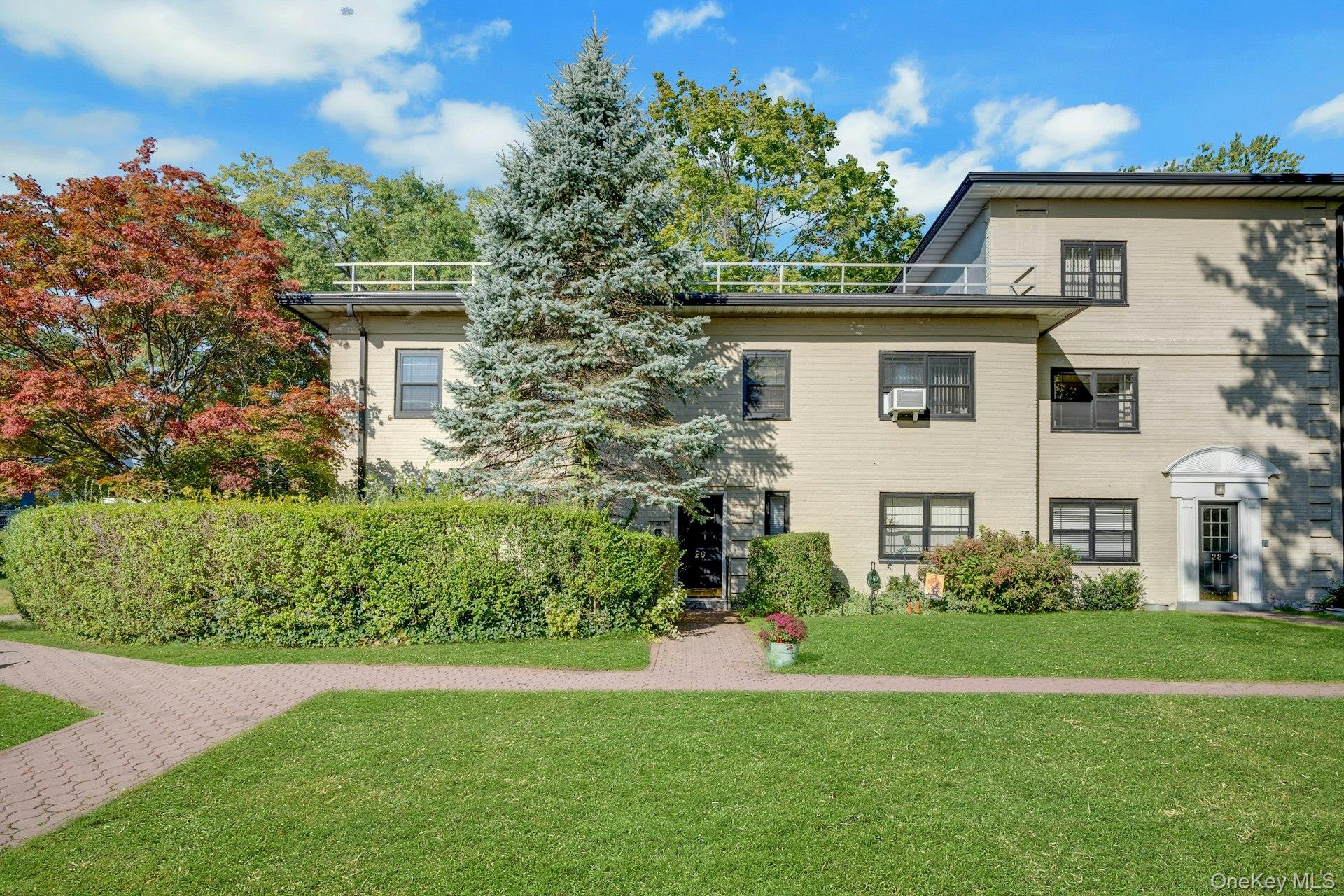 Beautifully updated one-bedroom corner coop  filled with abundant natu...