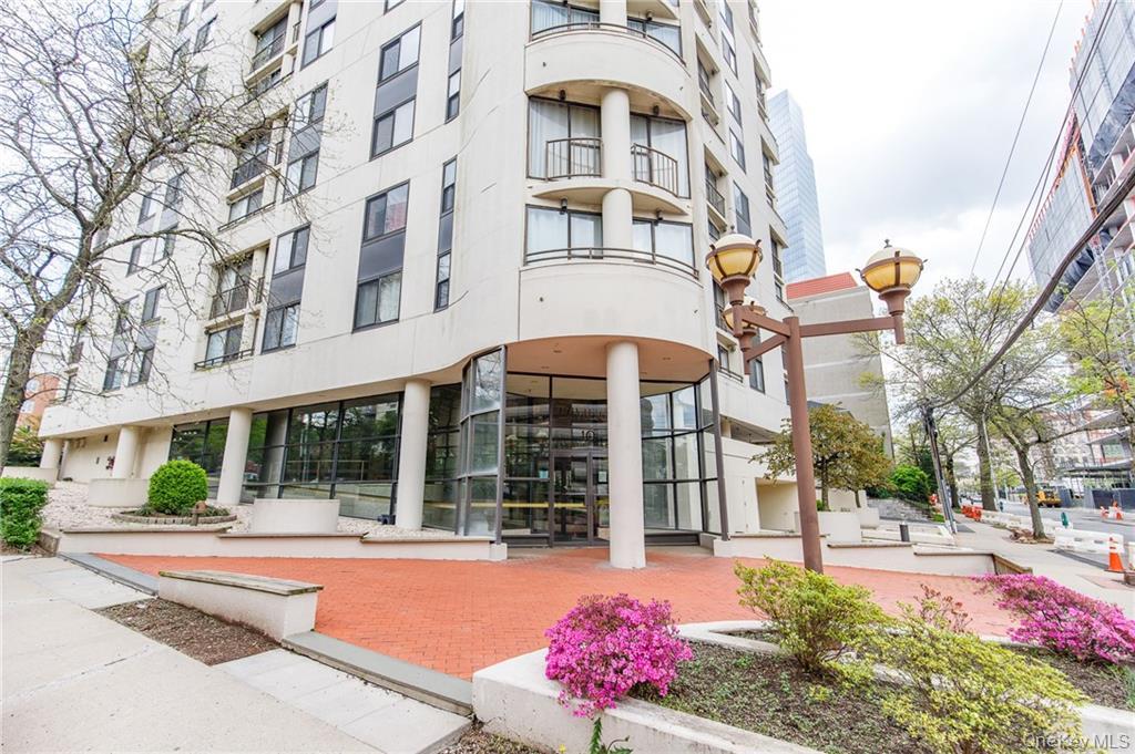 Welcome to 10 Cottage Place! This luxurious Bright corner unit with op...