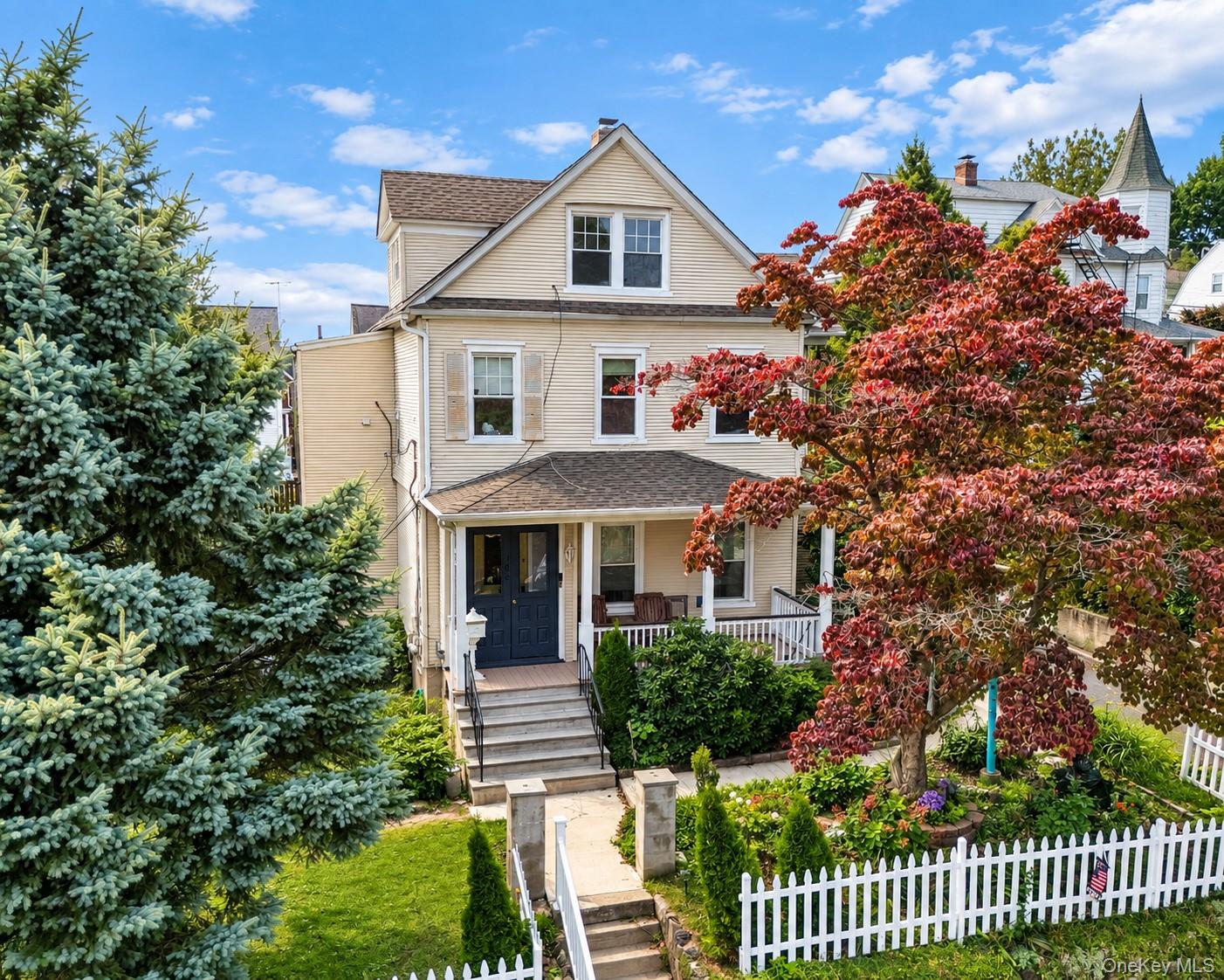 Victorian style two family with character and charm sits on Soundview...