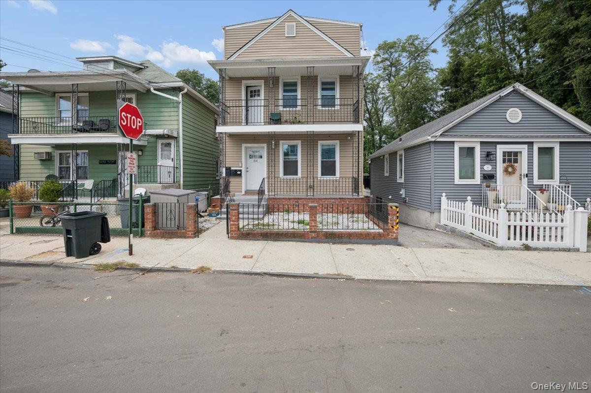 Located on the second floor of a three-family property, this two-bedro...