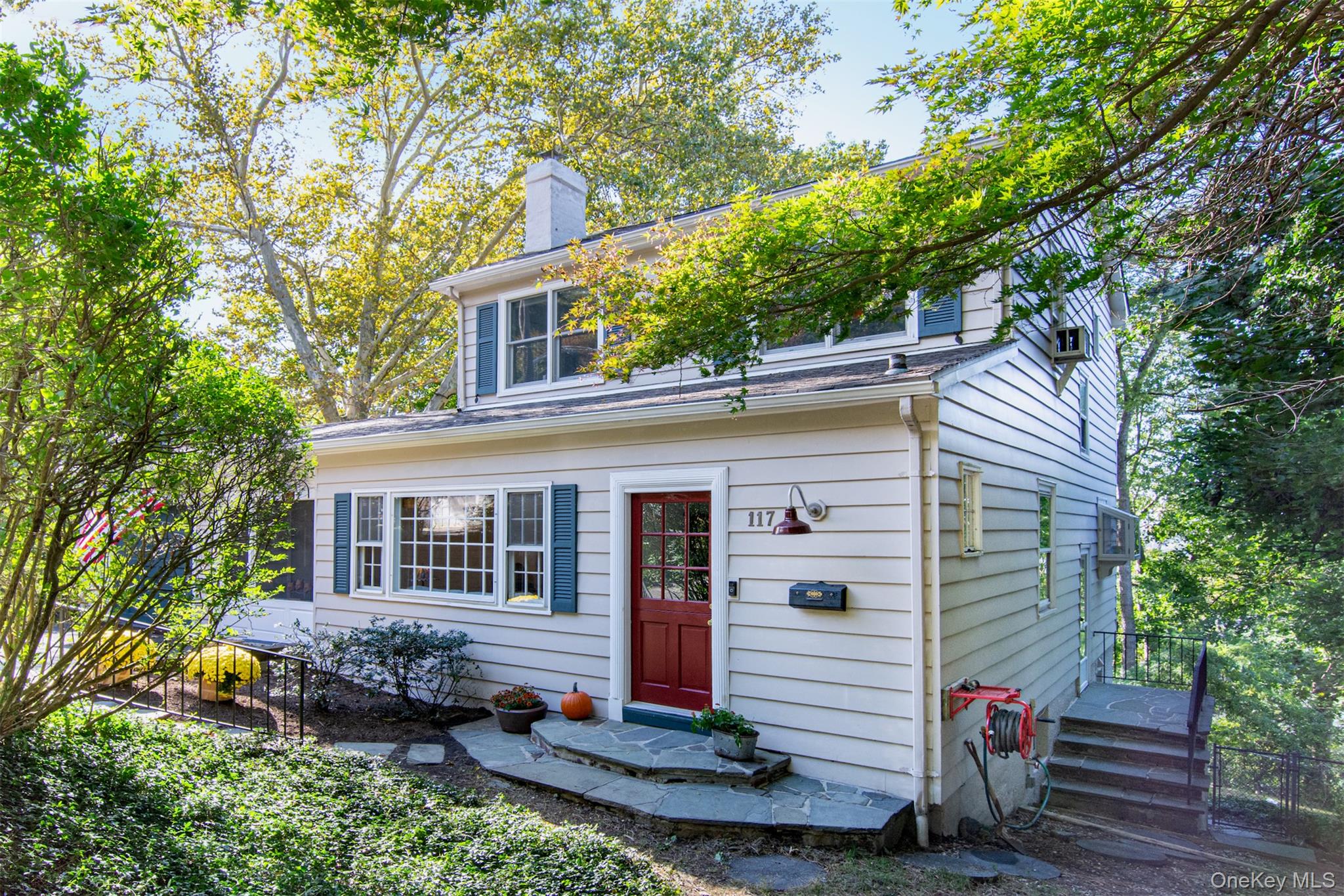 This charming home nestled on a hillside in the Riverview Manor neighb...