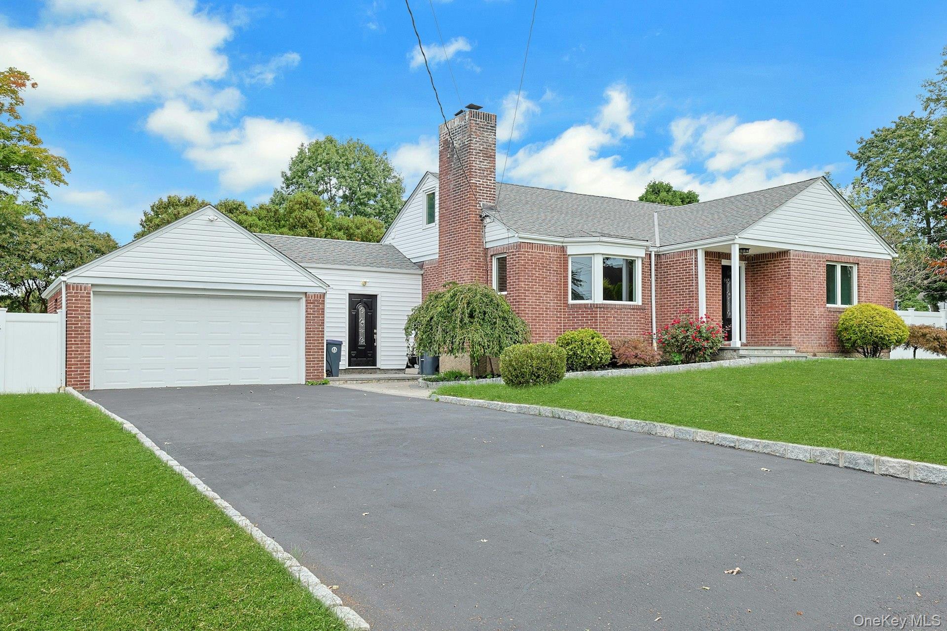 Welcome to This Beautifully Updated Brick Ranch!  Enjoy the ease of on...