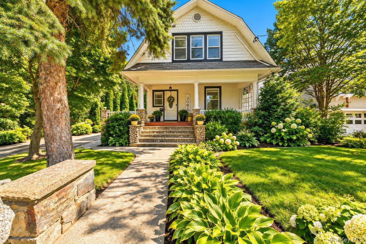 This 3-bedroom, 2.5-bath Dutch Colonial in the Rye Neck School Distric...