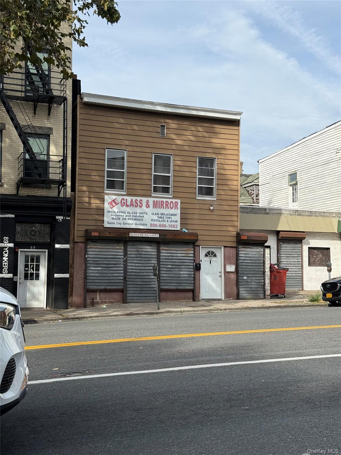 Taxpayer on busy Yonkers Ave with a longtime tenant in the storefront...