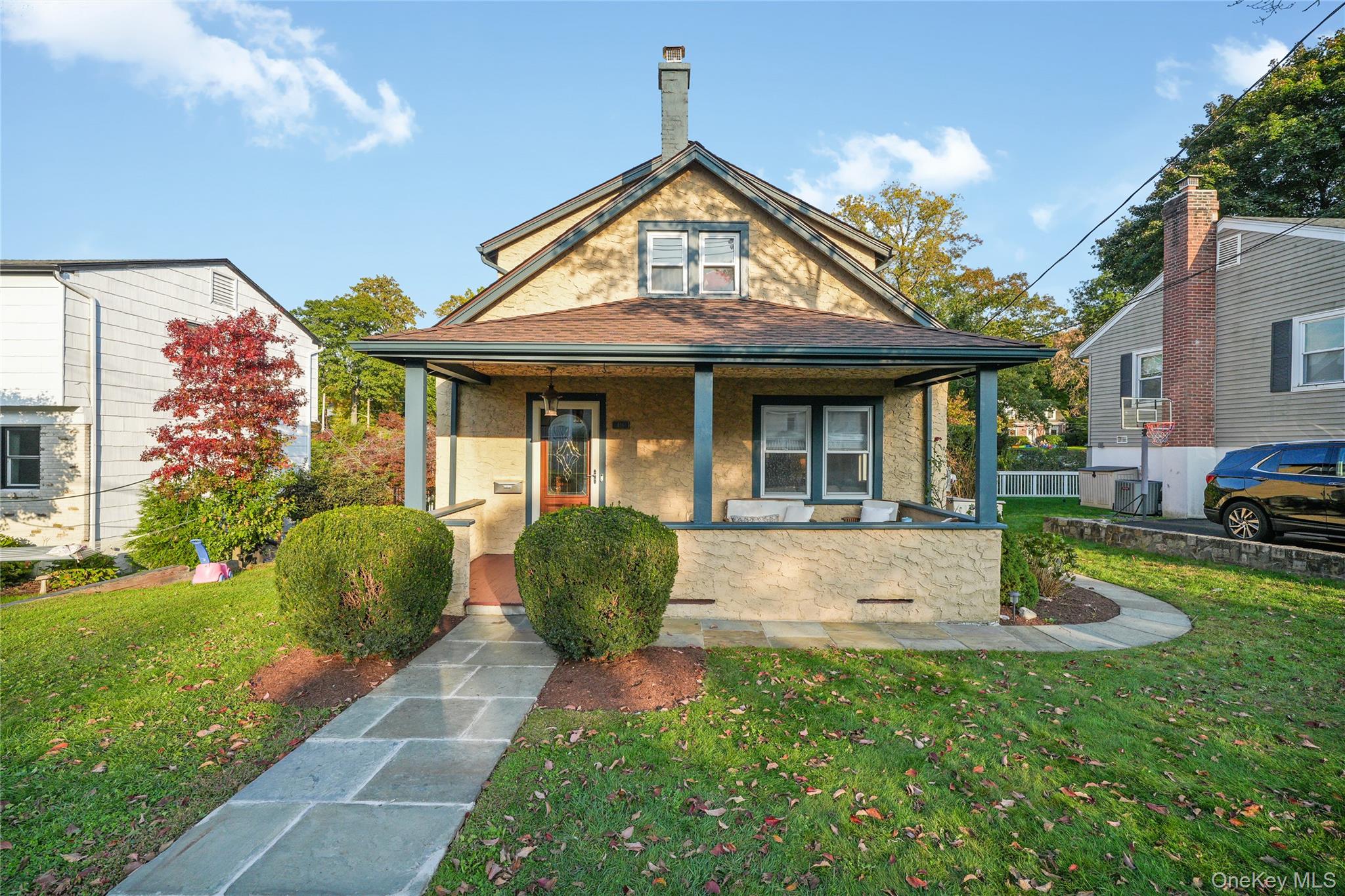 Welcome to this charming three-bedroom Colonial in Hawthorne, featurin...