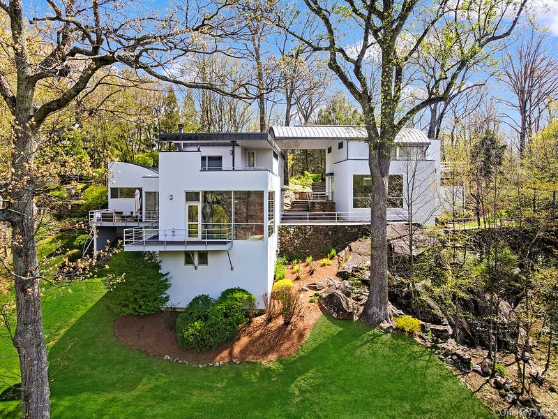 The Cross Pond Residence, designed by acclaimed architect Frank Lupo,...
