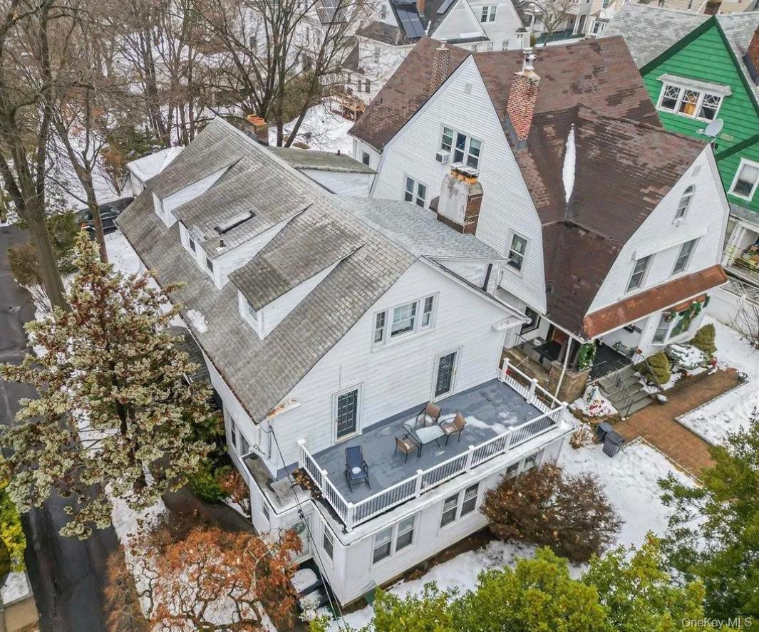 Welcome to 375 Park Ave, a grand and versatile Center Hall Colonial Re...