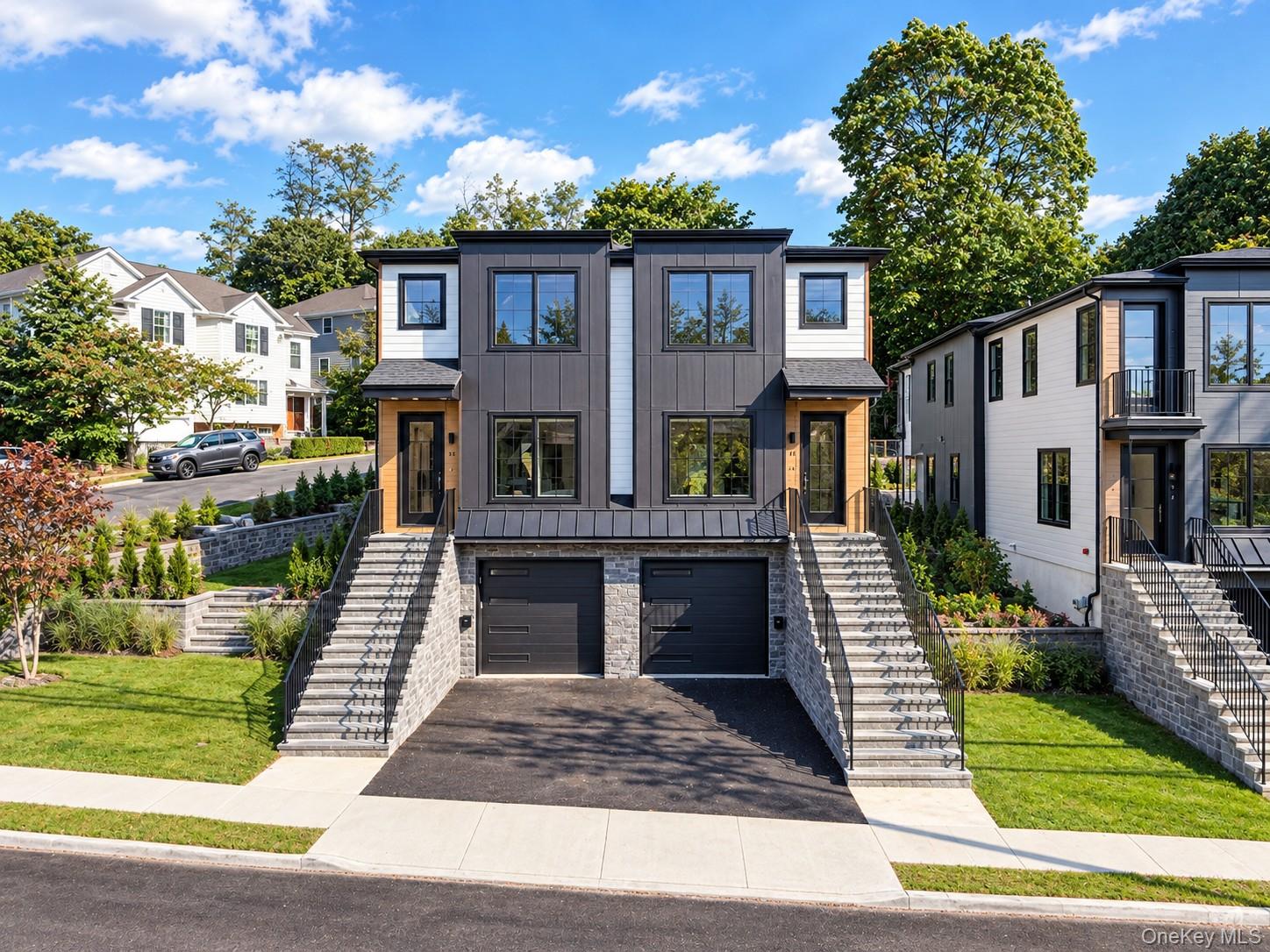 Welcome to West Harrison’s newest luxury townhome, where striking cont...
