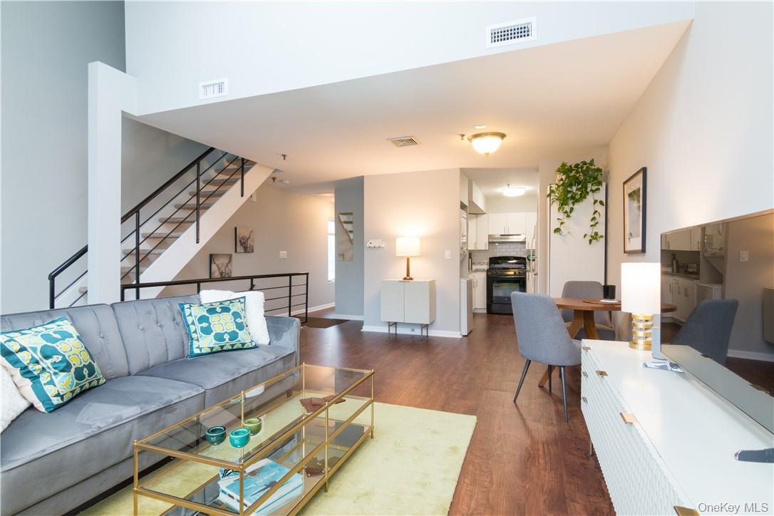 This fantastic completely renovated 2 level town home end unit is loca...