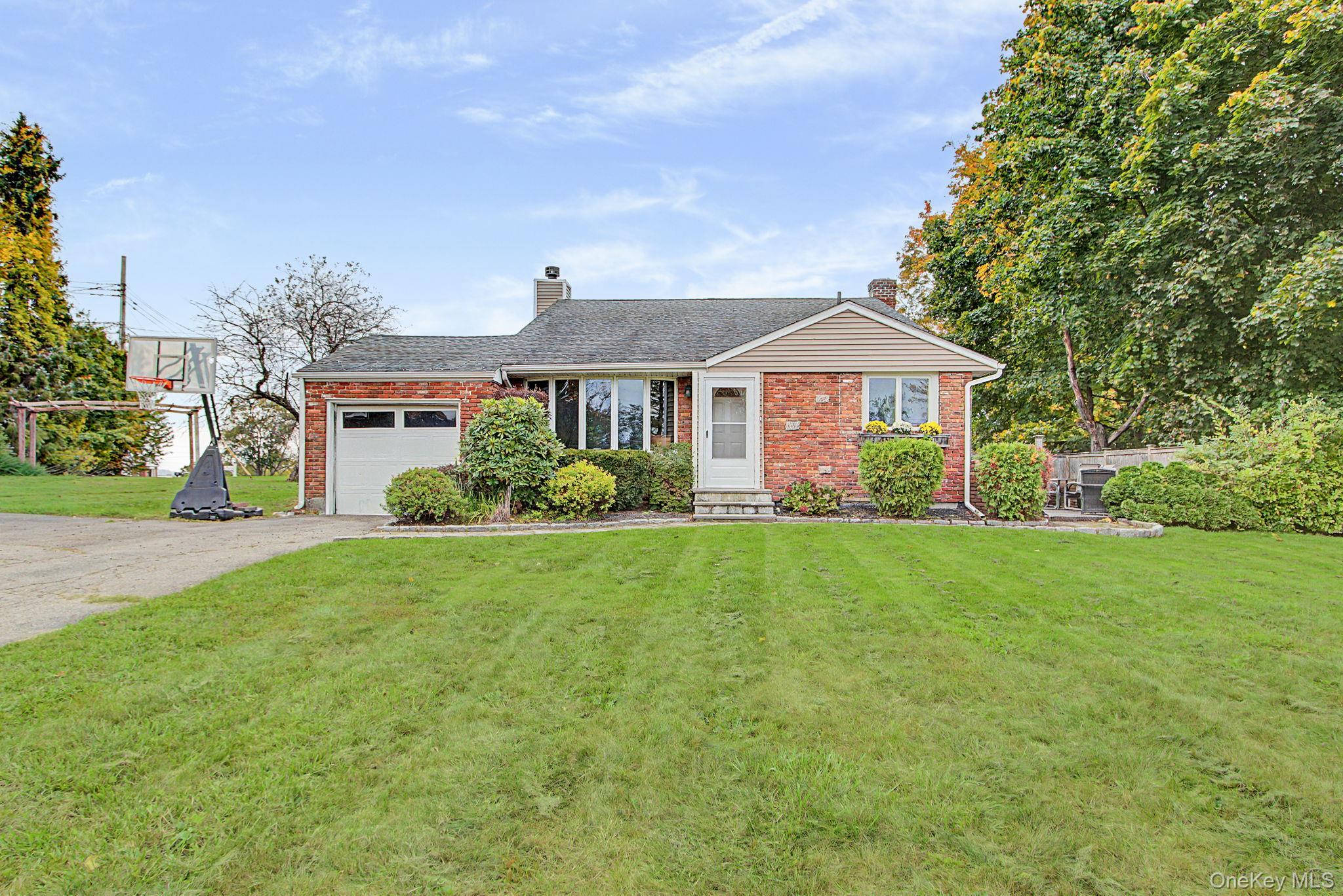 Welcome to this inviting single family home featuring three bedrooms a...