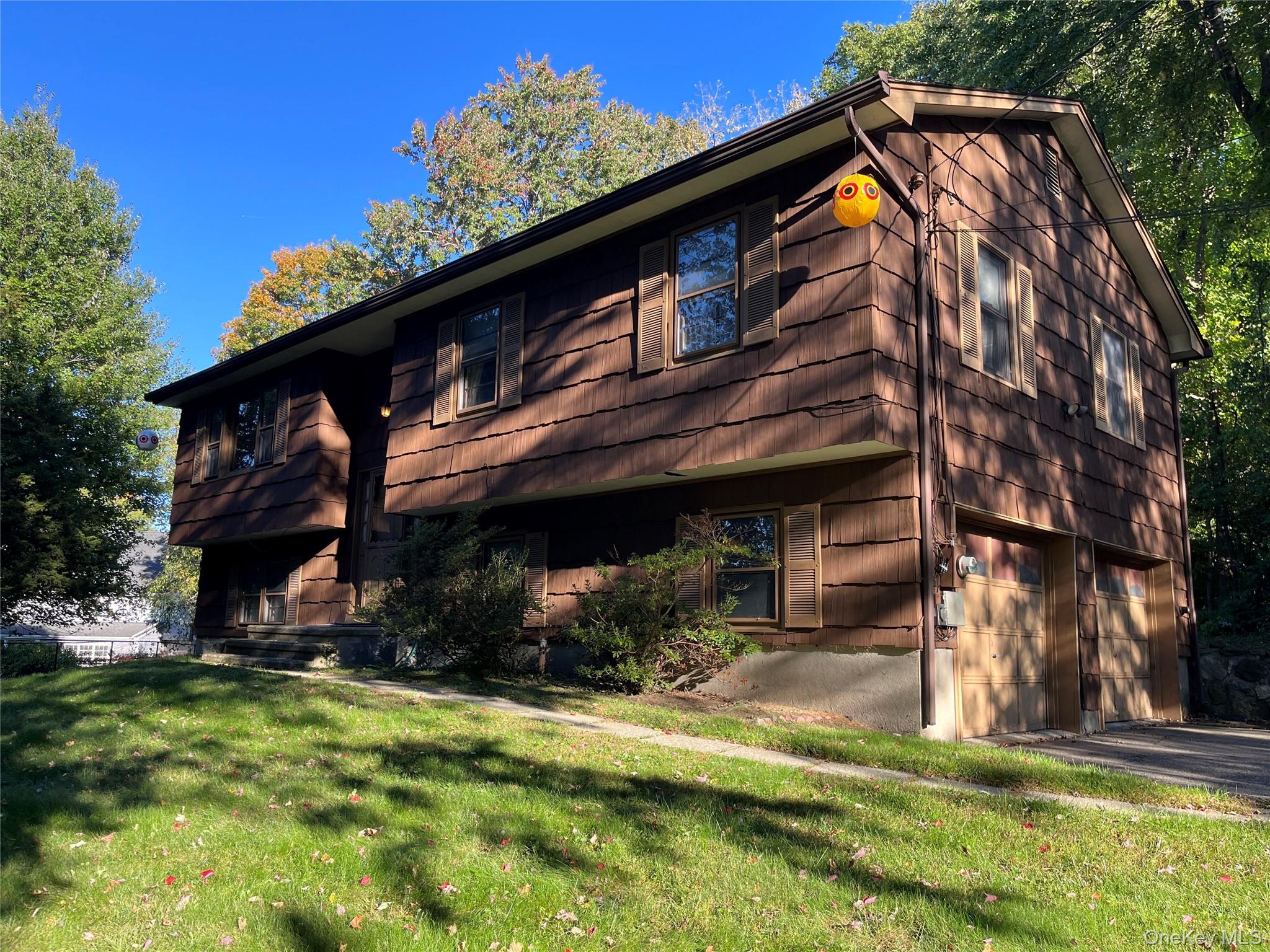 Welcome to 15 Rick Lane in Cortlandt Manor, a well maintained home own...