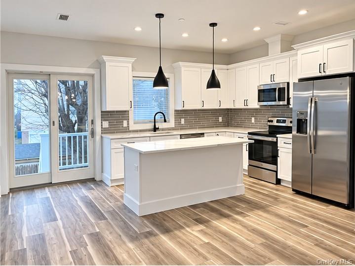 Welcome to West Harrison!  Here is an opportunity to live in a nearly...