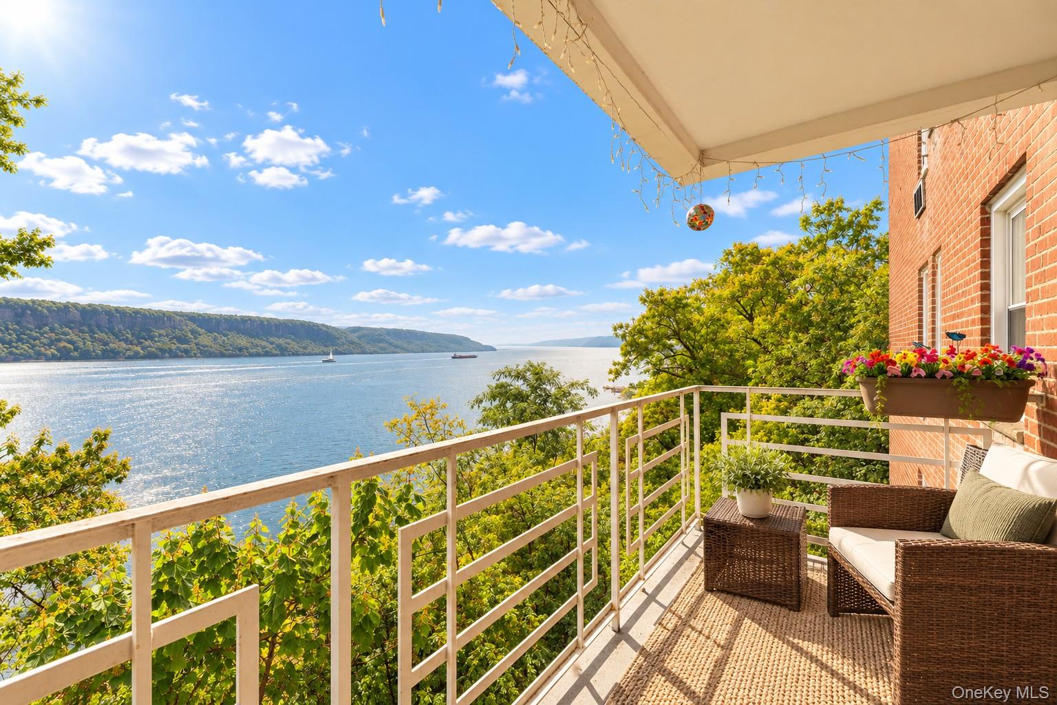 Enjoy stunning Hudson River views from your private terrace at Hudson...