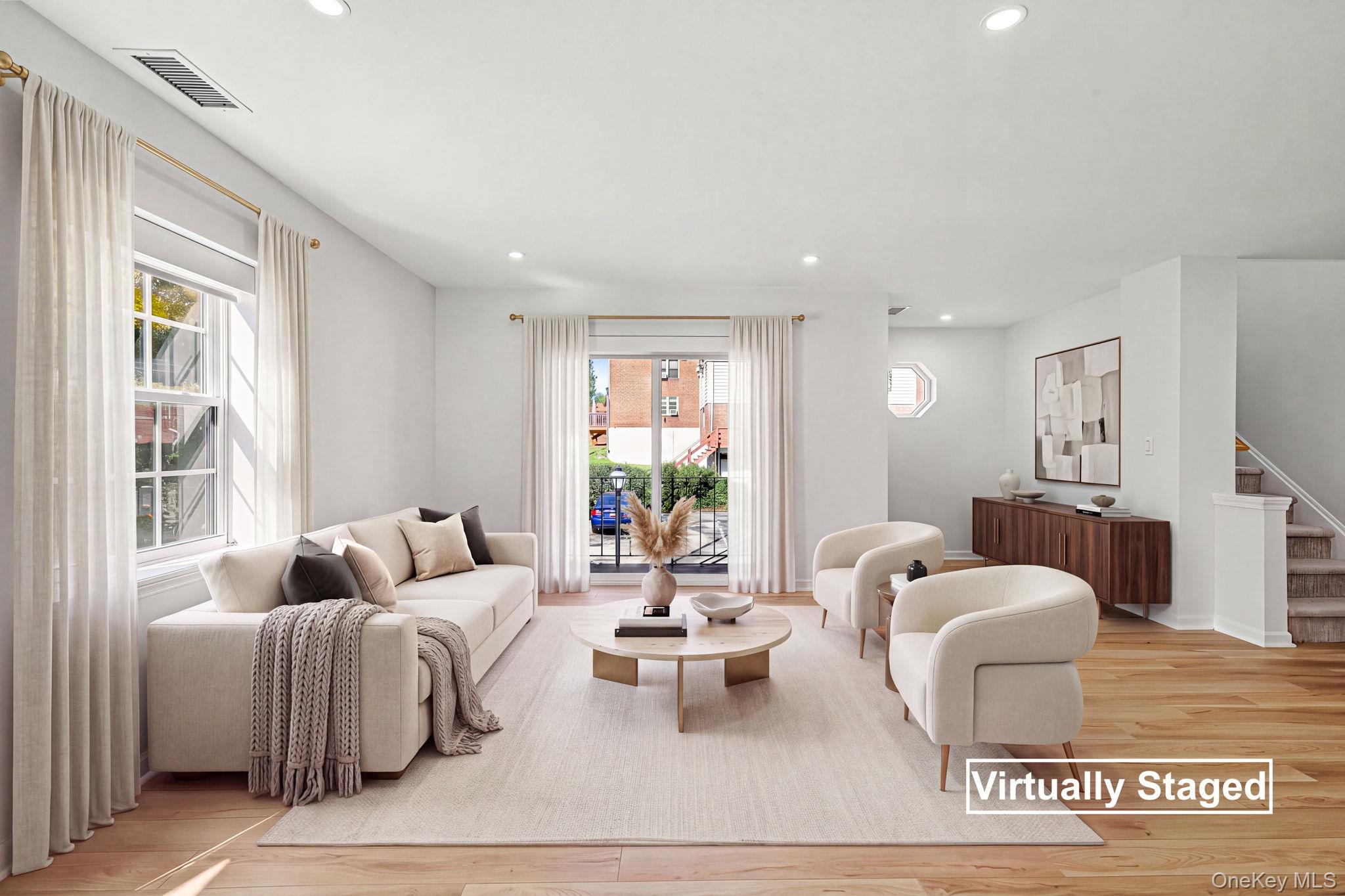 A sunlit, beautifully renovated townhouse in a coveted corner setting...