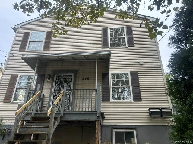 A rare, once-in-a-lifetime opportunity: a spacious two-family home fea...