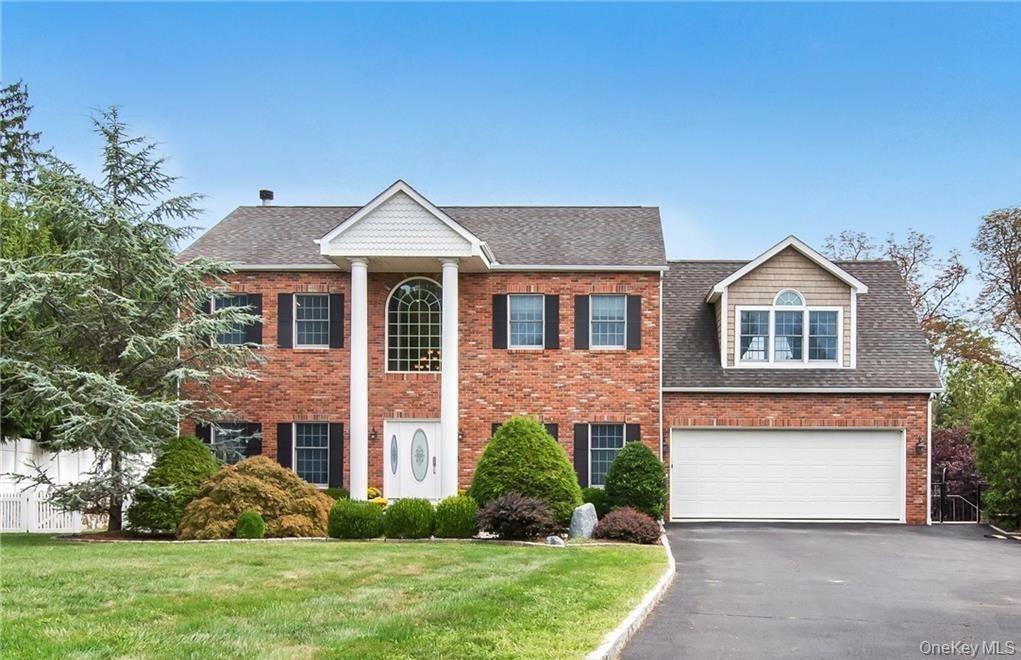 Welcome to 6 Gualtiere Lane, a pristine 4+ bedroom, 3.5-bath brick Col...