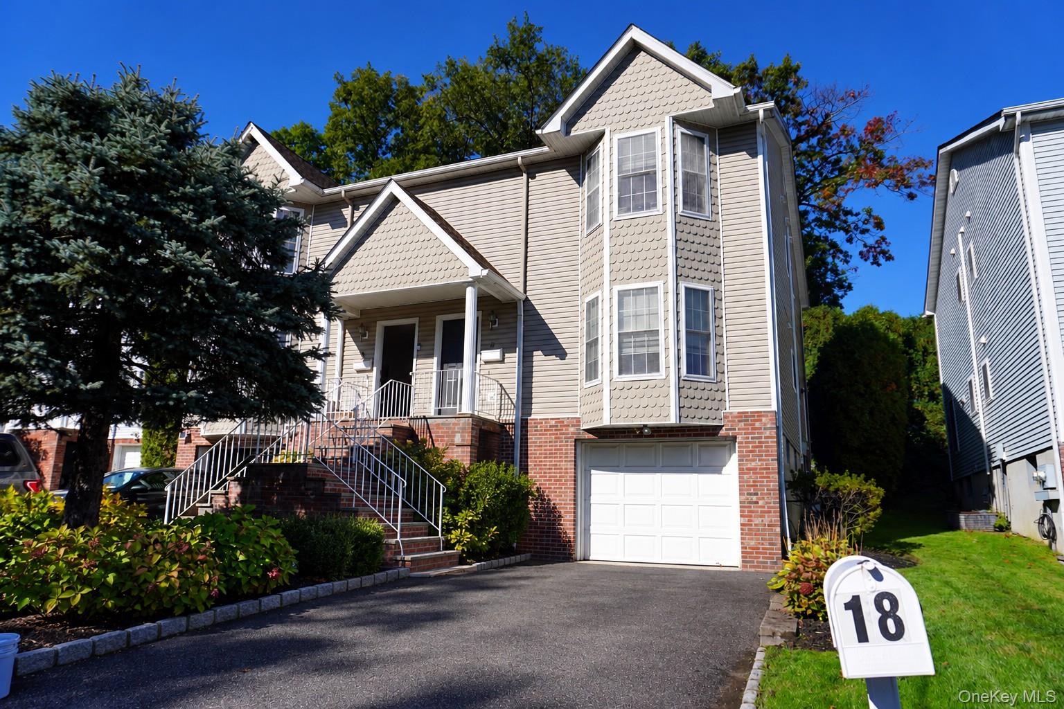 Tucked in a private cul-de-sac in the heart of Harrison, this 3-bedroo...
