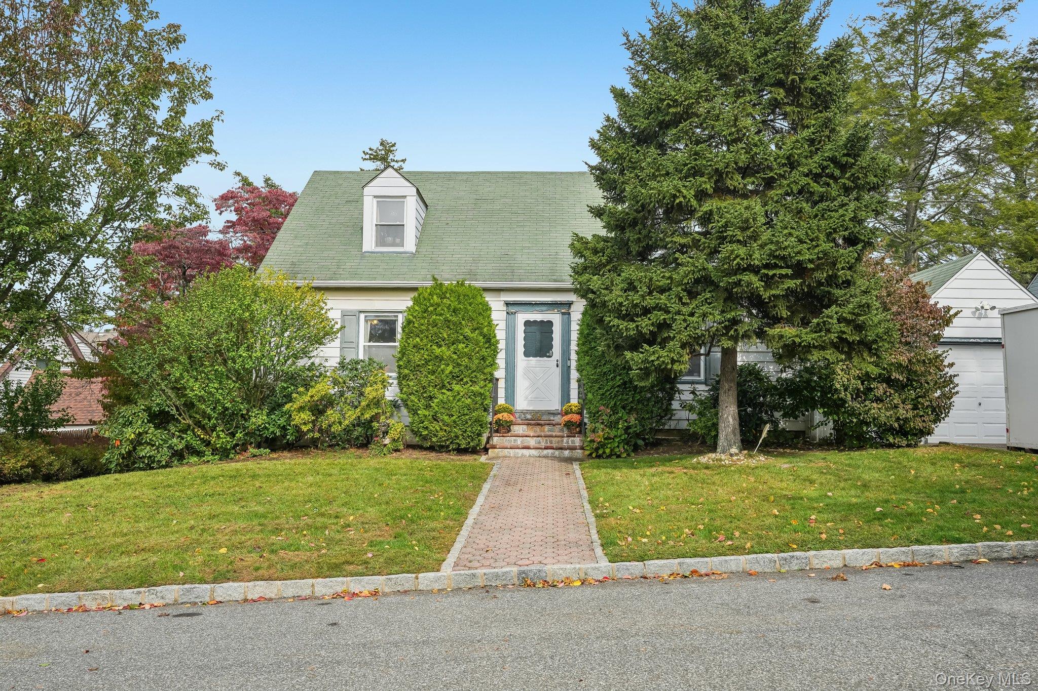 Welcome to this affordable and spacious 4-bedroom, 2.5-bath Cape Cod-s...