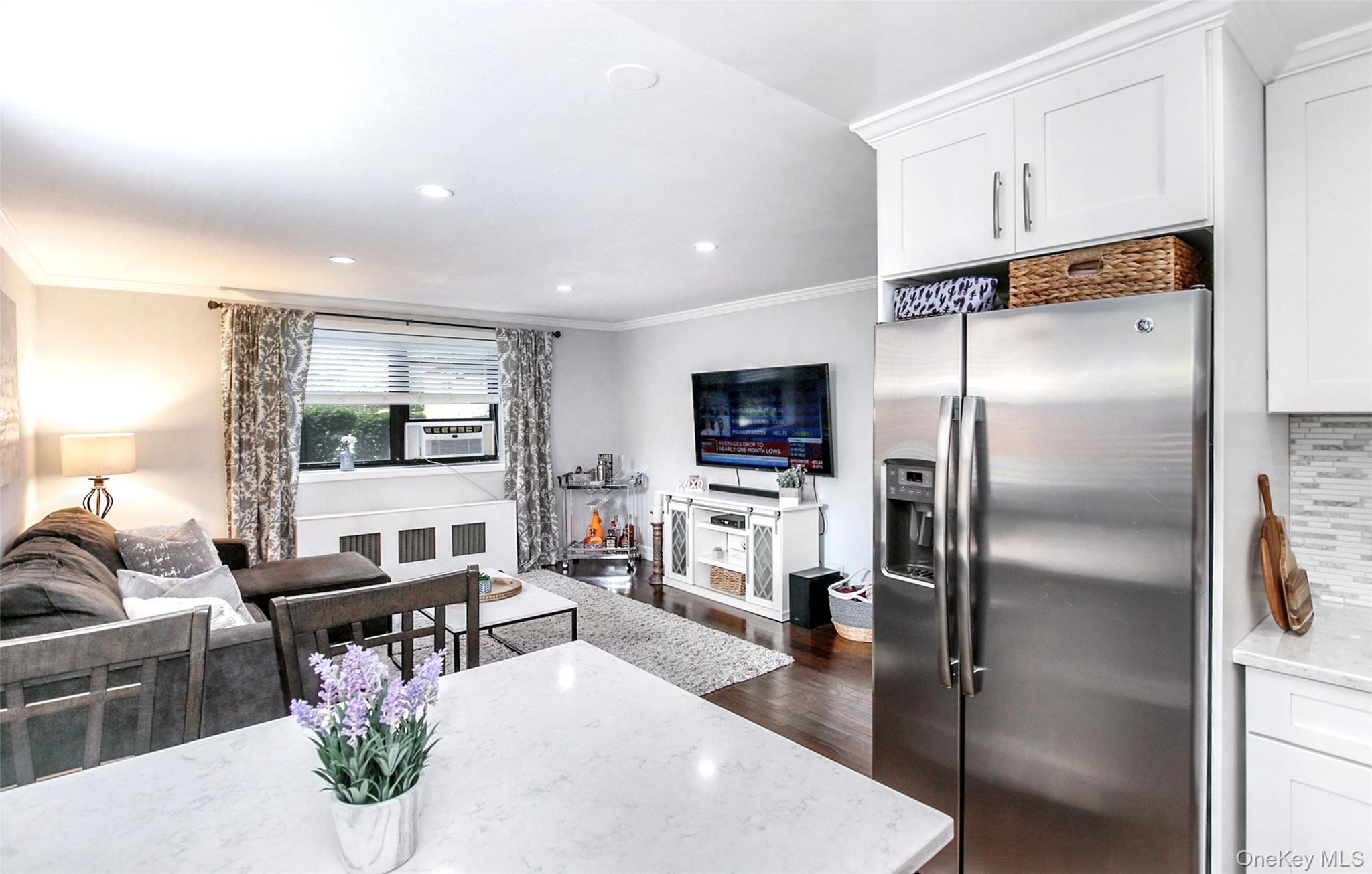 Welcome home to this bright and beautifully updated co-op in the heart...