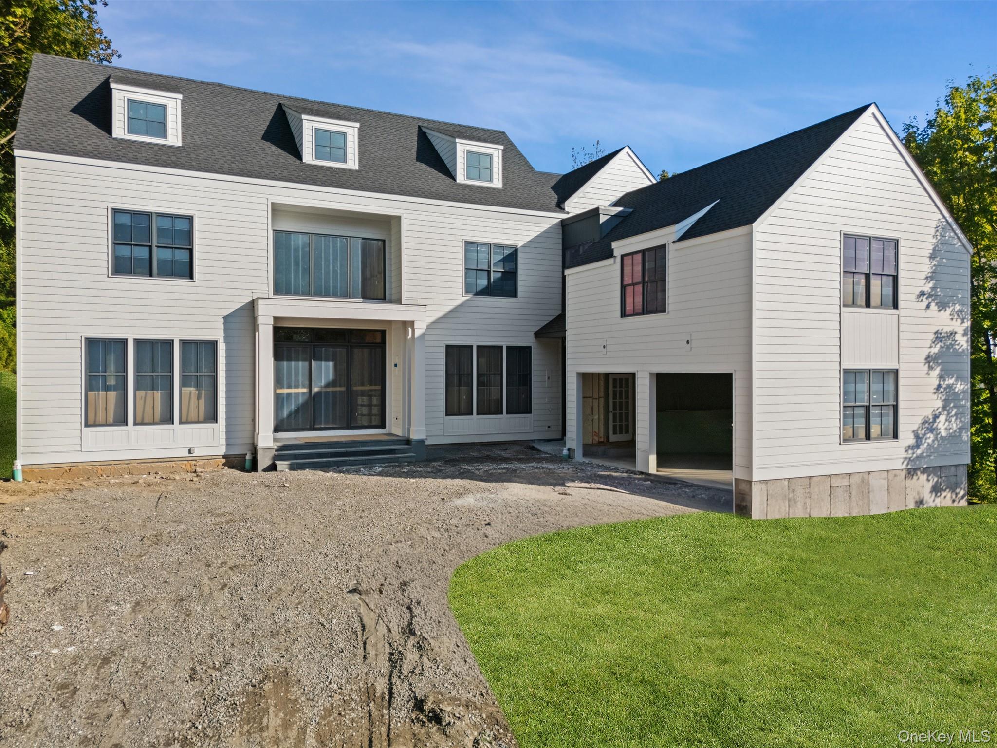 This magnificent new construction house in the Grange in Greenacres bo...