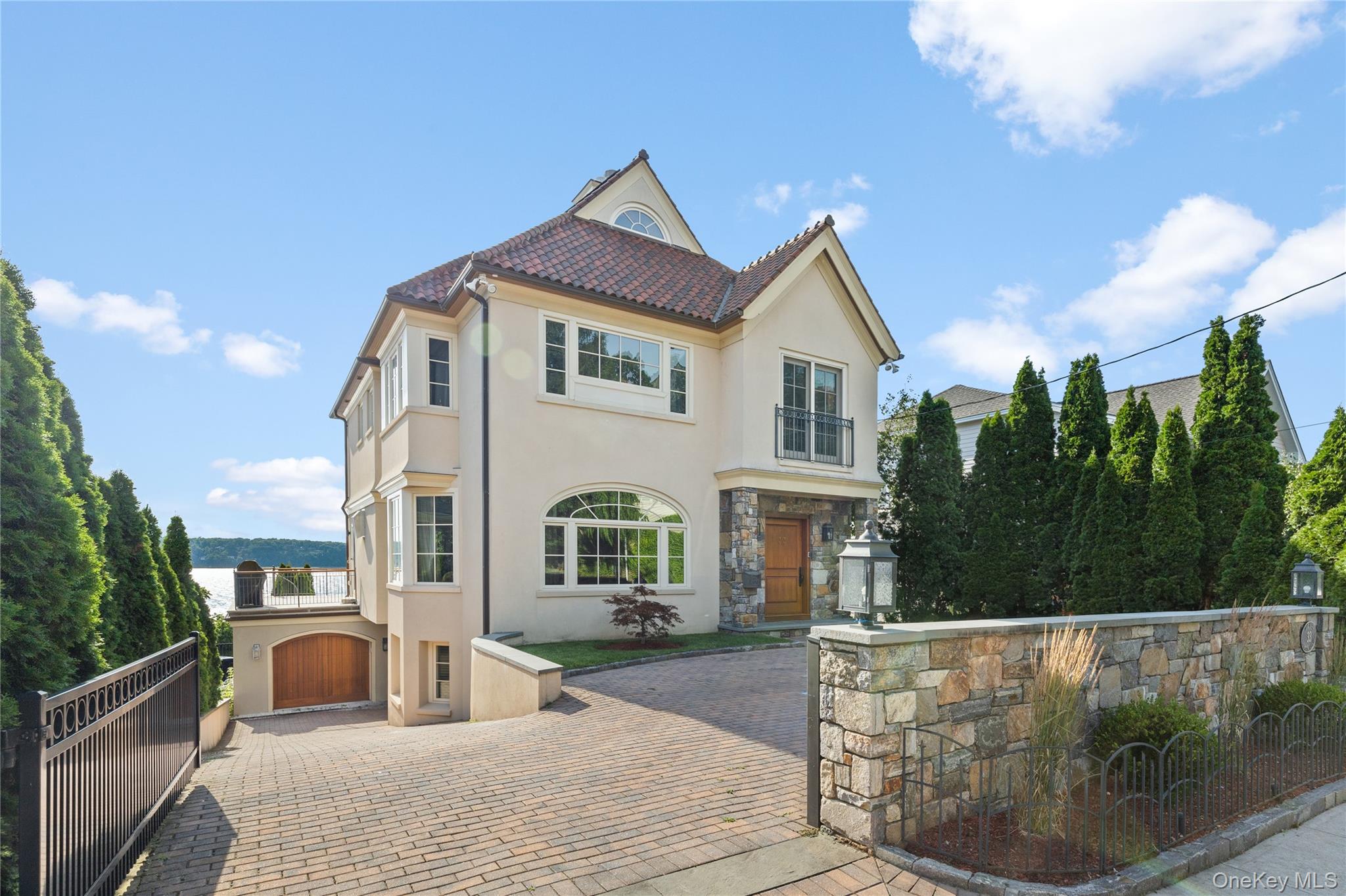 Breathtaking Panoramic Hudson River Views! This stunning, custom-built...