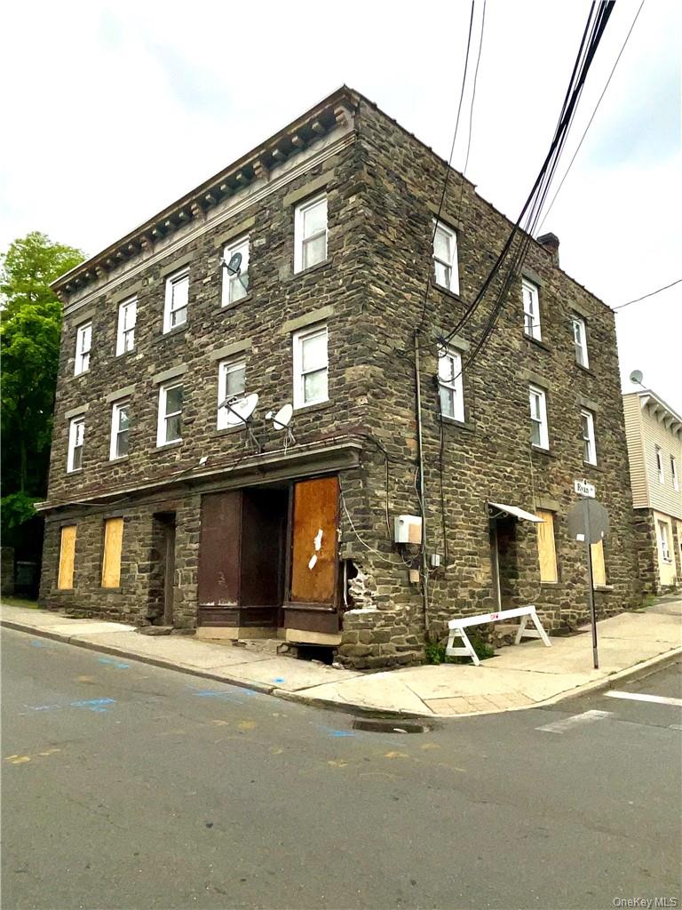 PLEASE READ CAREFULLY.  This all stone multi-family property is a grea...